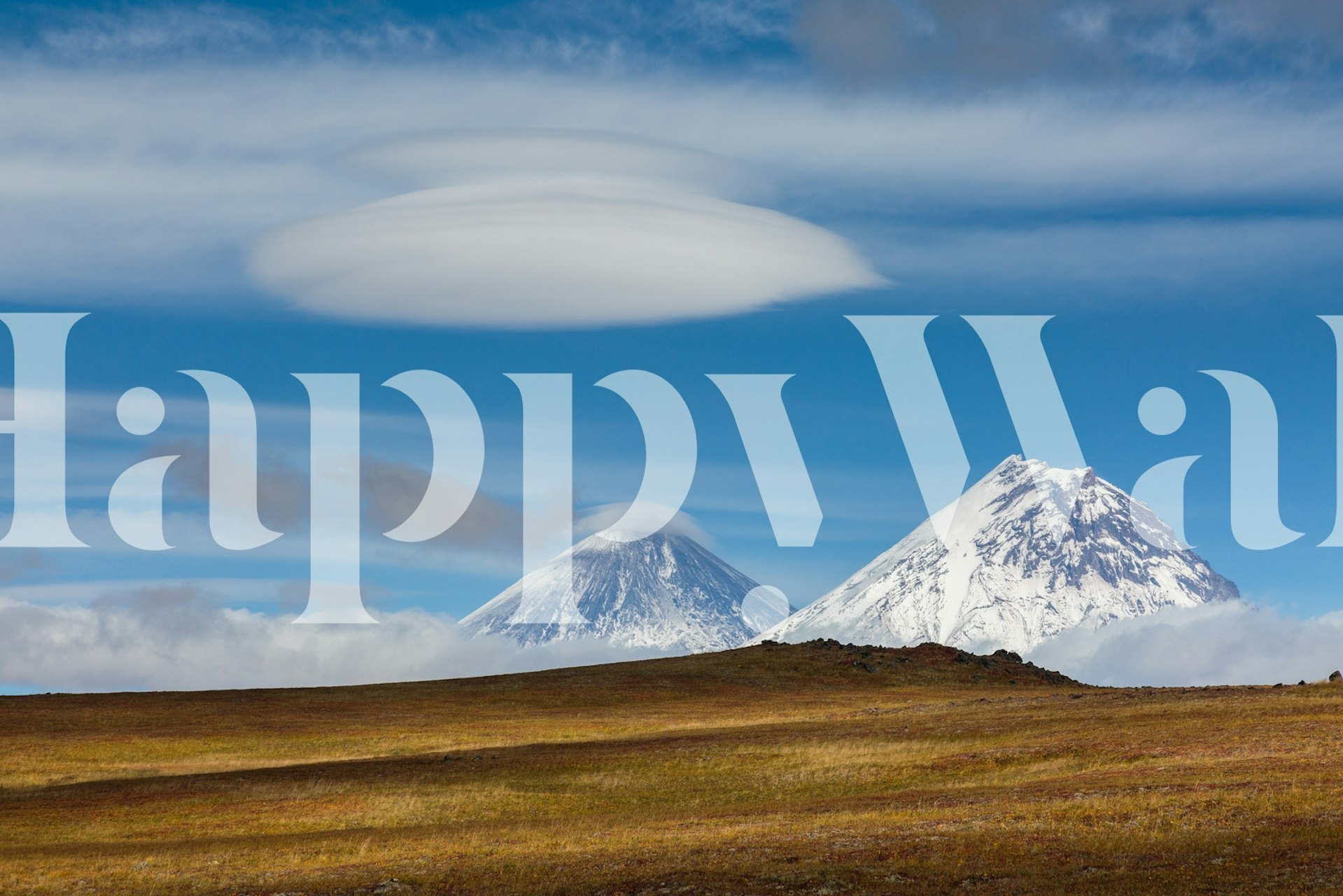 Snow-capped mountains with blue sky wallpaper