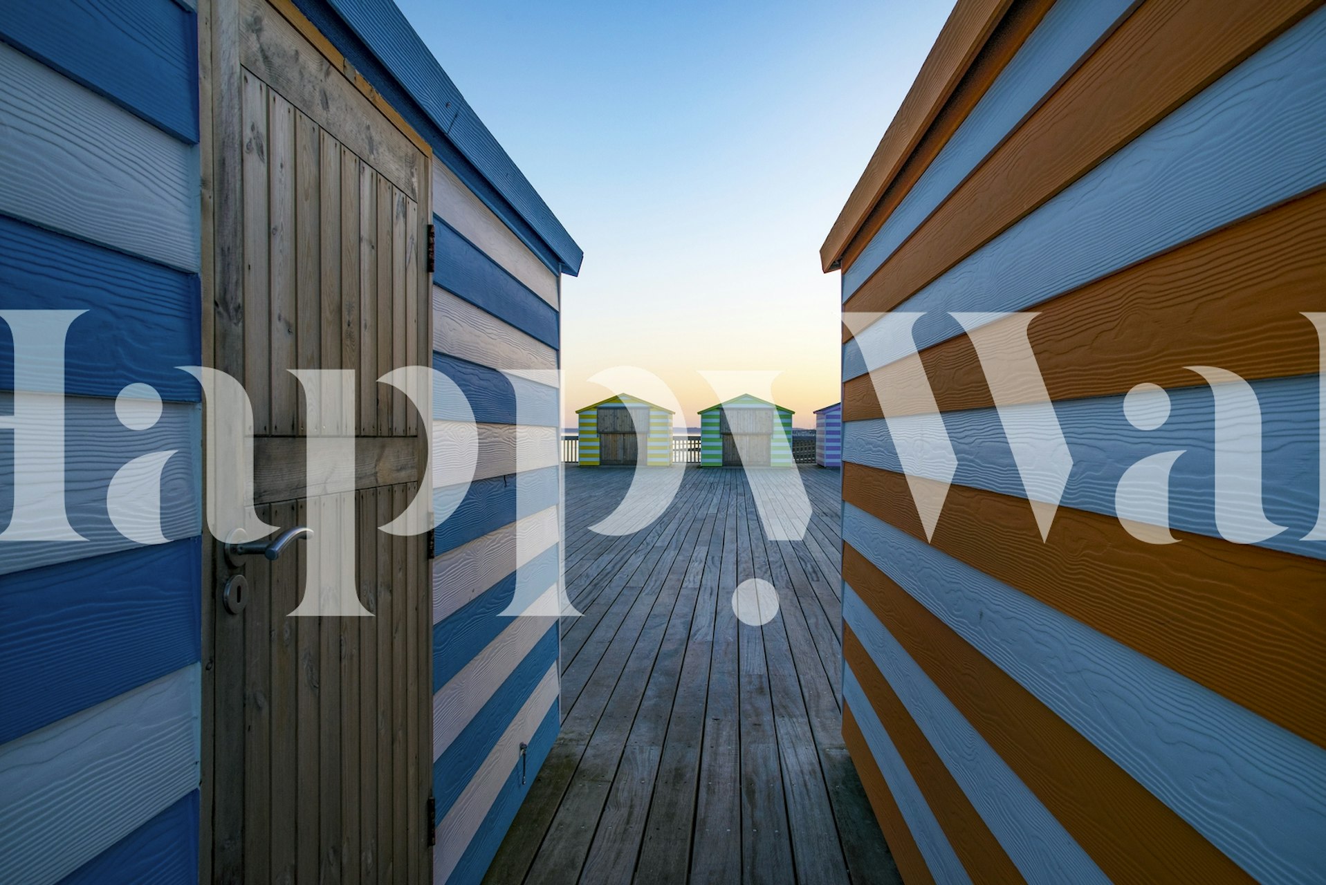 Colorful striped beach huts at sunset wallpaper
