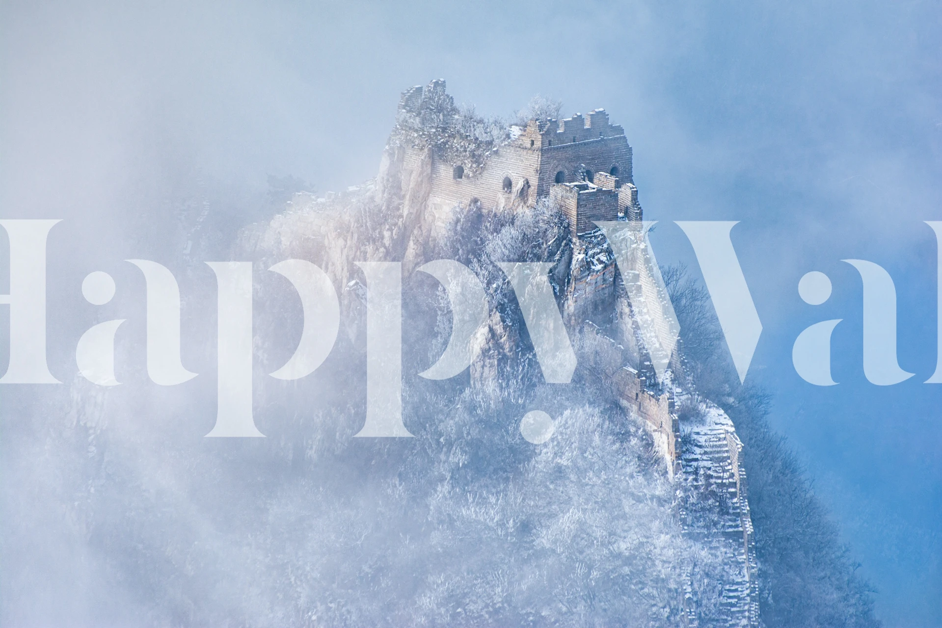 Fog-covered mountain landscape with ancient ruins wallpaper