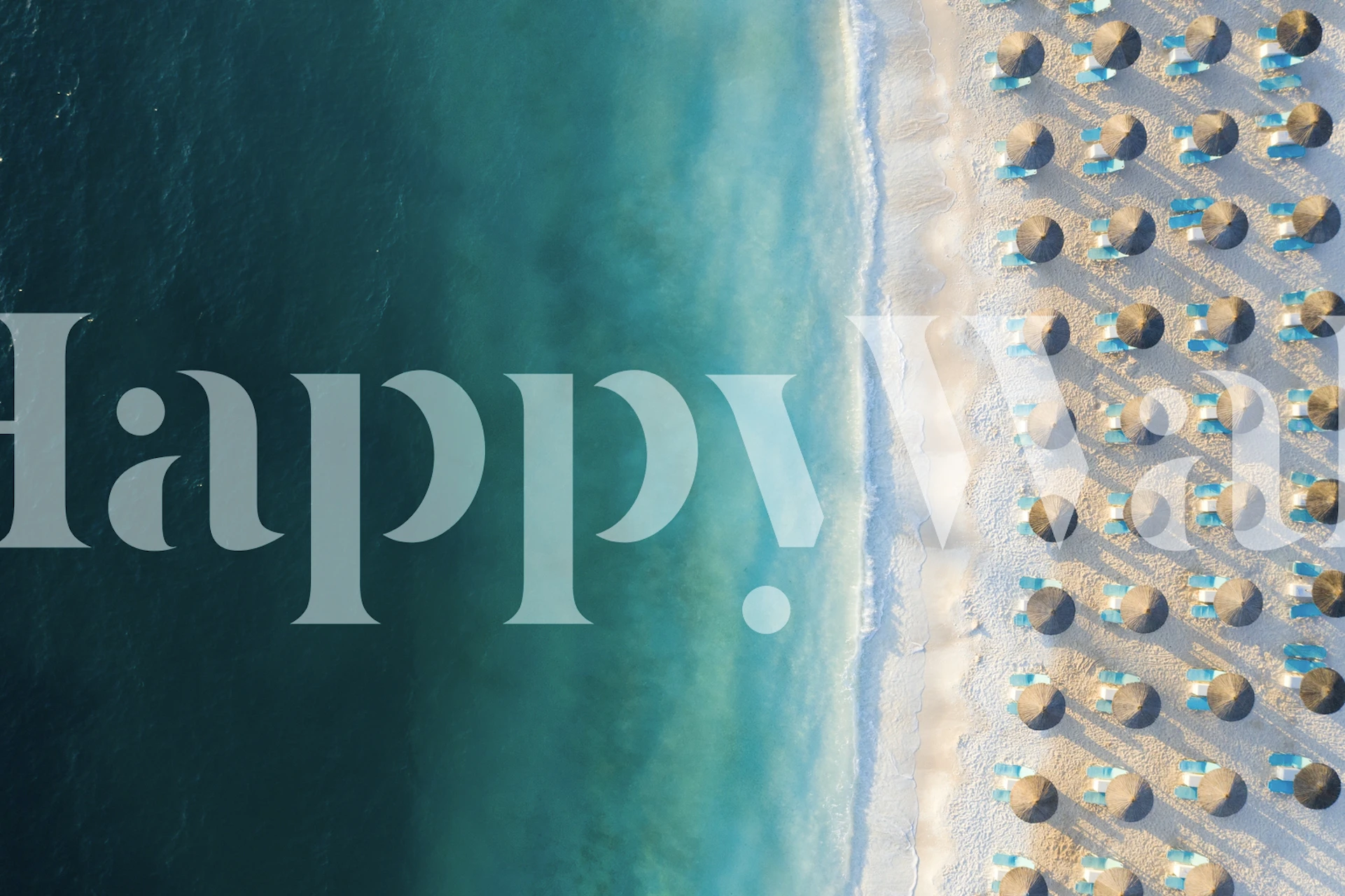 Aerial view of beach umbrellas, blue ocean, and sandy shore wallpaper