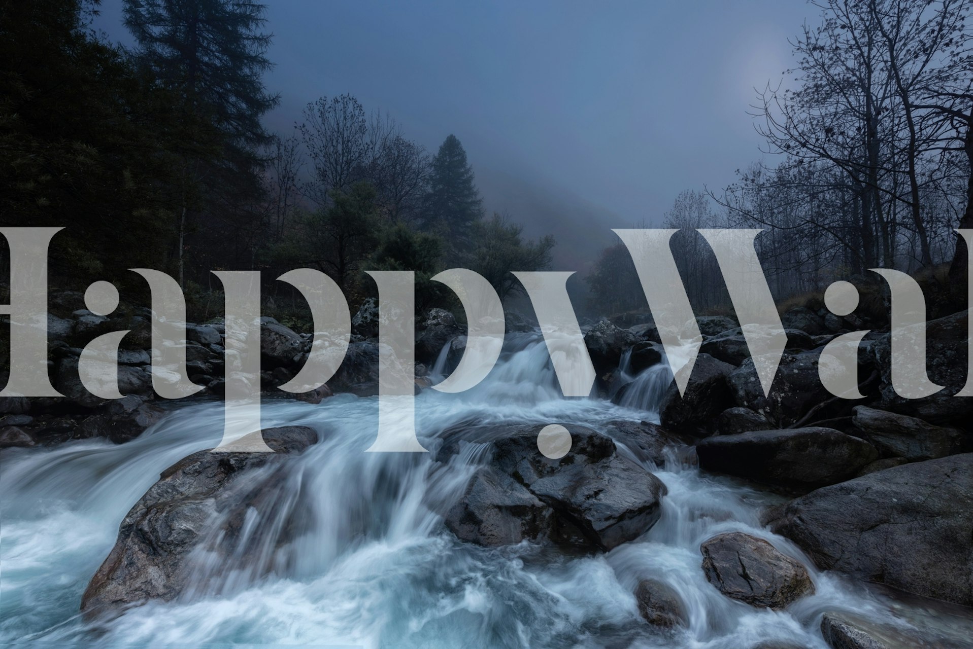Flowing water over rocks in a natural setting blue wallpaper