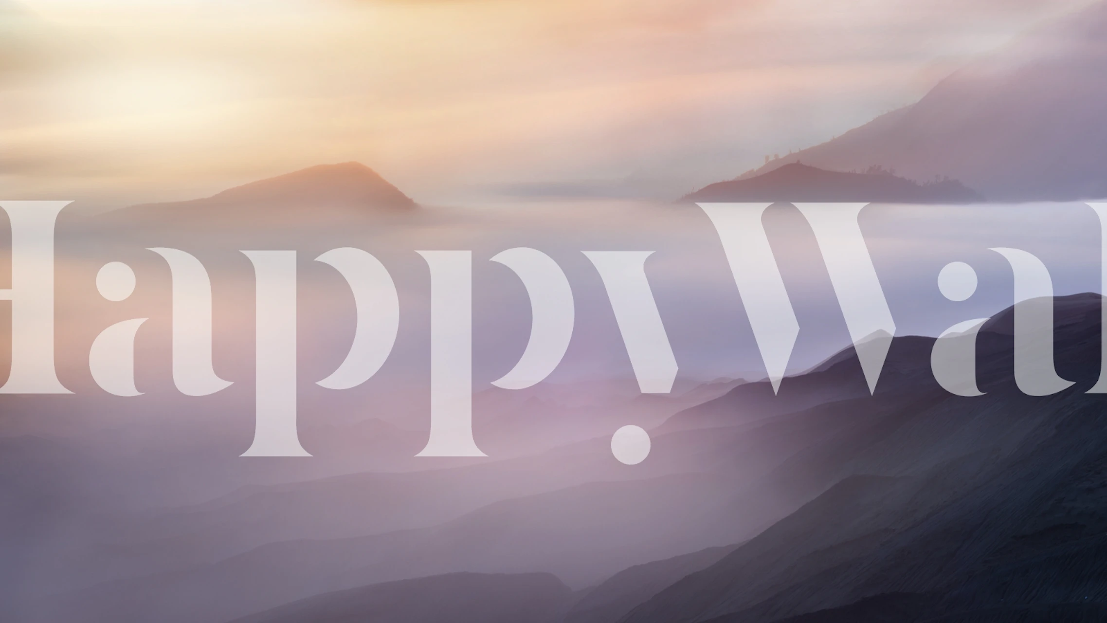 Soft purple mountain landscape wall mural with misty background