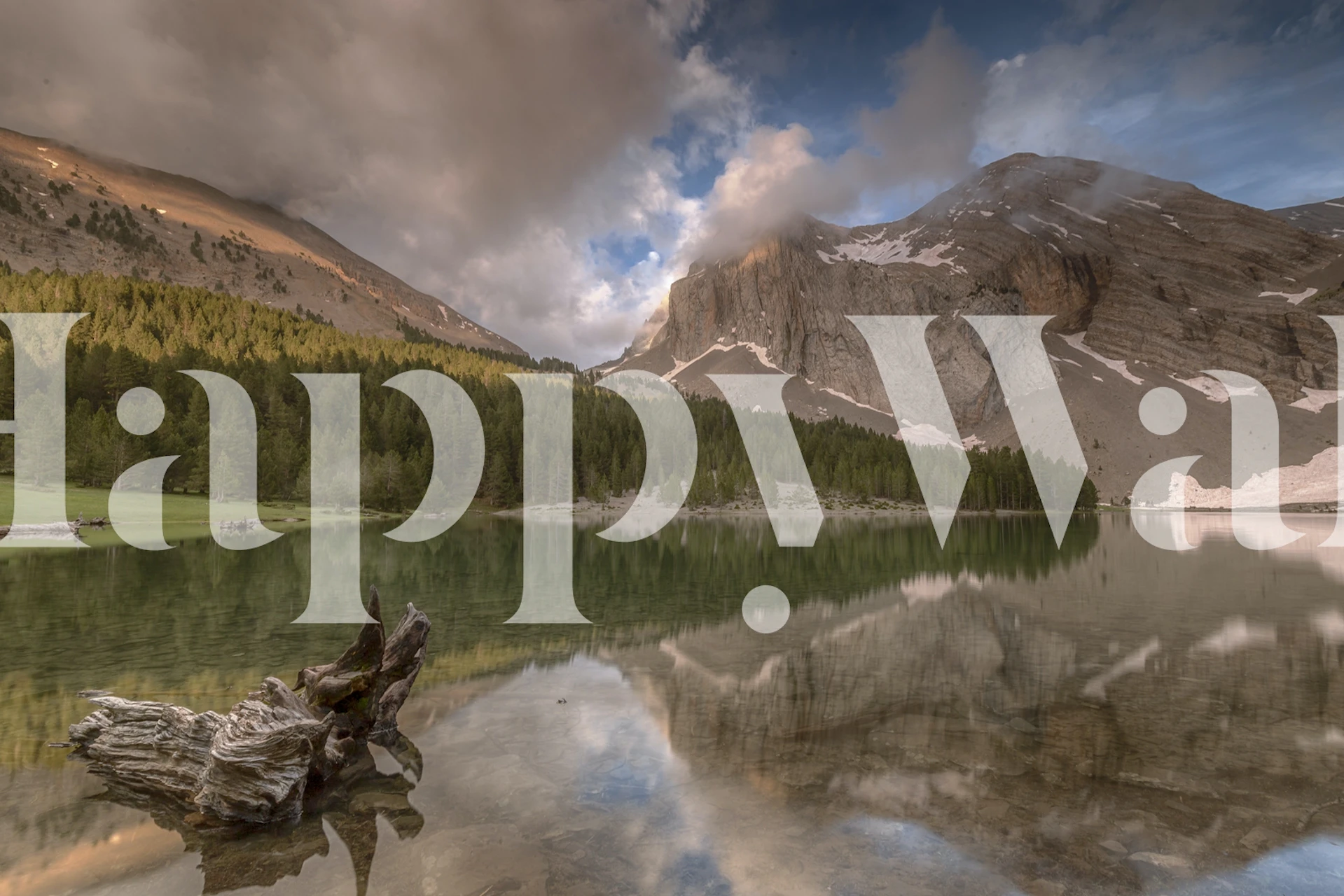 Ibon de Plan mountain lake wall mural with reflective water and forested landscape