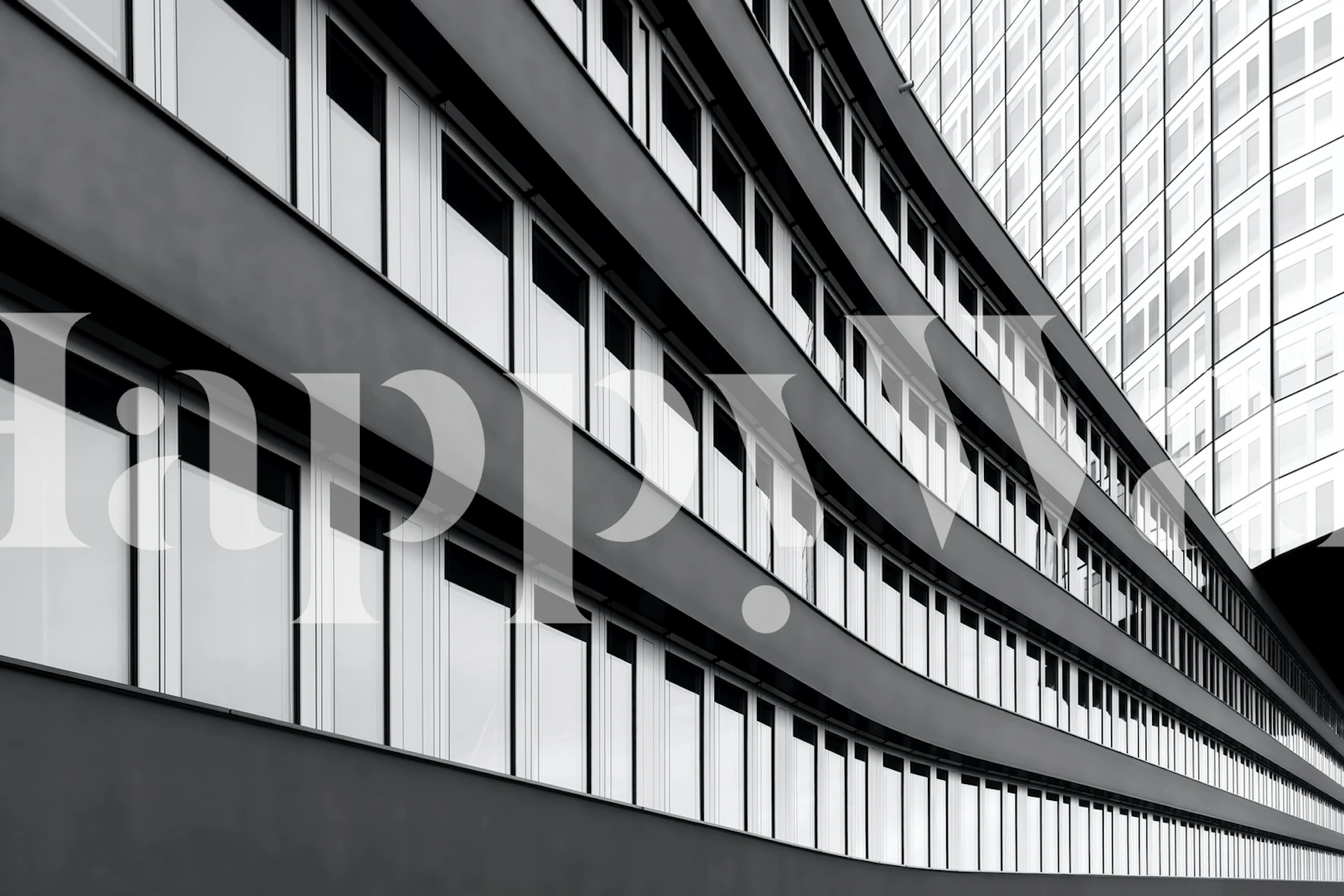 Black and white wall mural featuring modern architectural lines of a workplace building