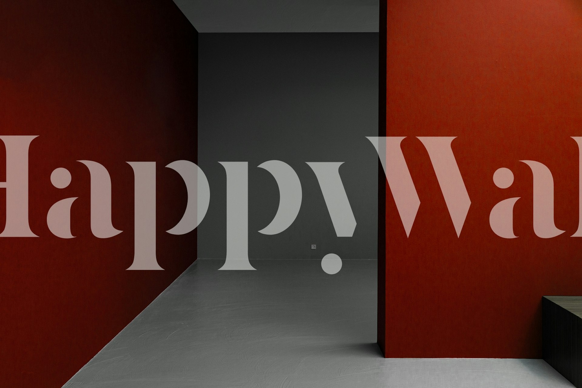 μοντέρνα μινιμαλιστική εσωτερική τοιχογραφία με κόκκινους και γκρι αντίθετους τοίχους που δημιουργούν βάθος και προοπτική