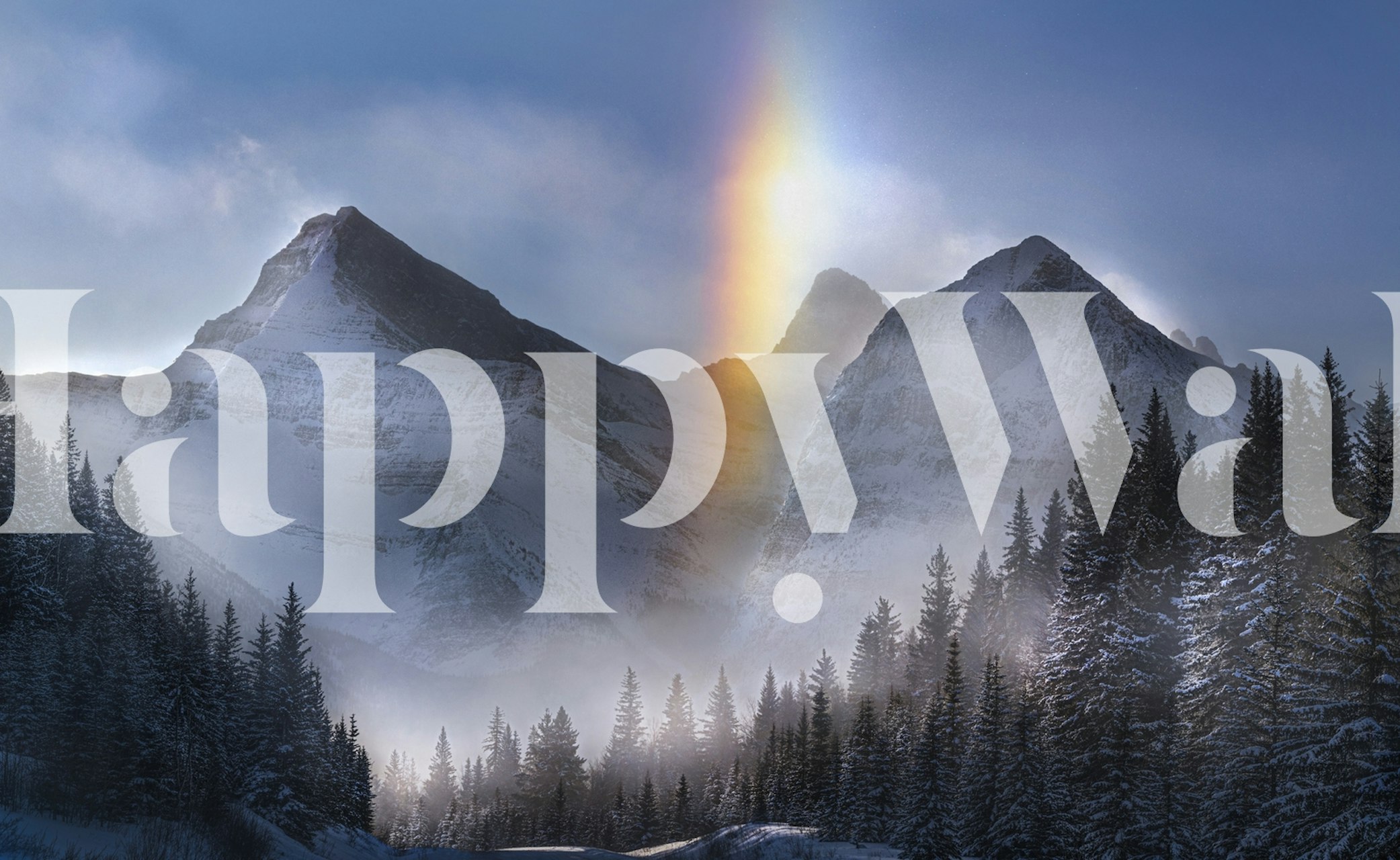 Mountain landscape with snow, evergreen trees, and a rainbow wallpaper