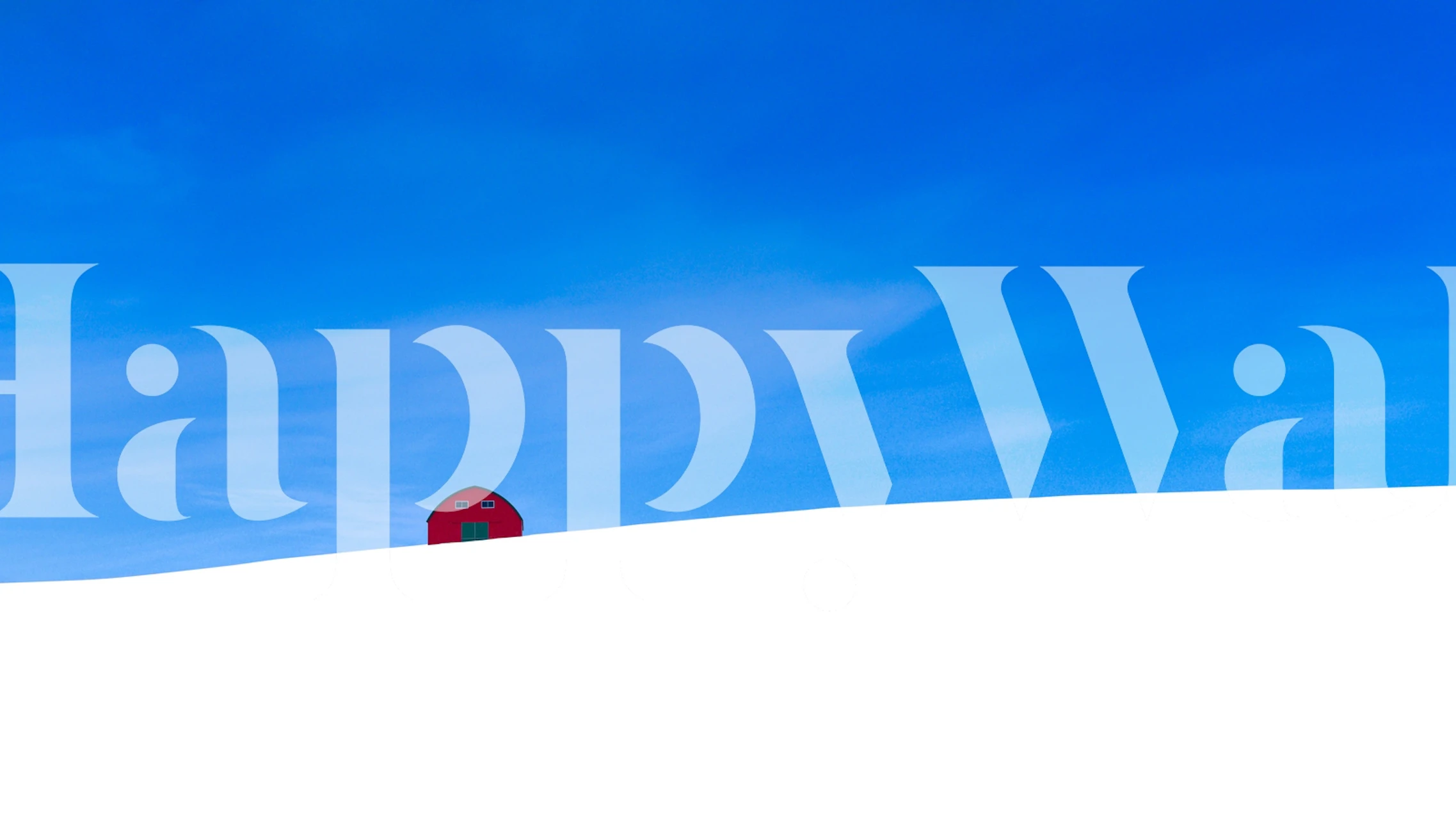 Red barn on white landscape under bright blue sky wallpaper