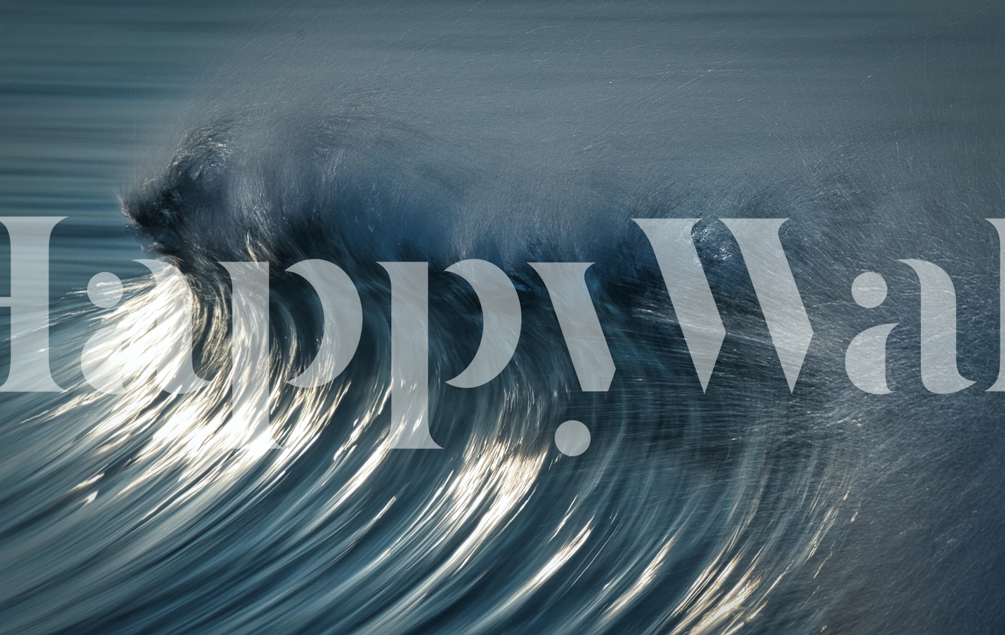 Ocean wave in blue tones with reflective surfaces wallpaper