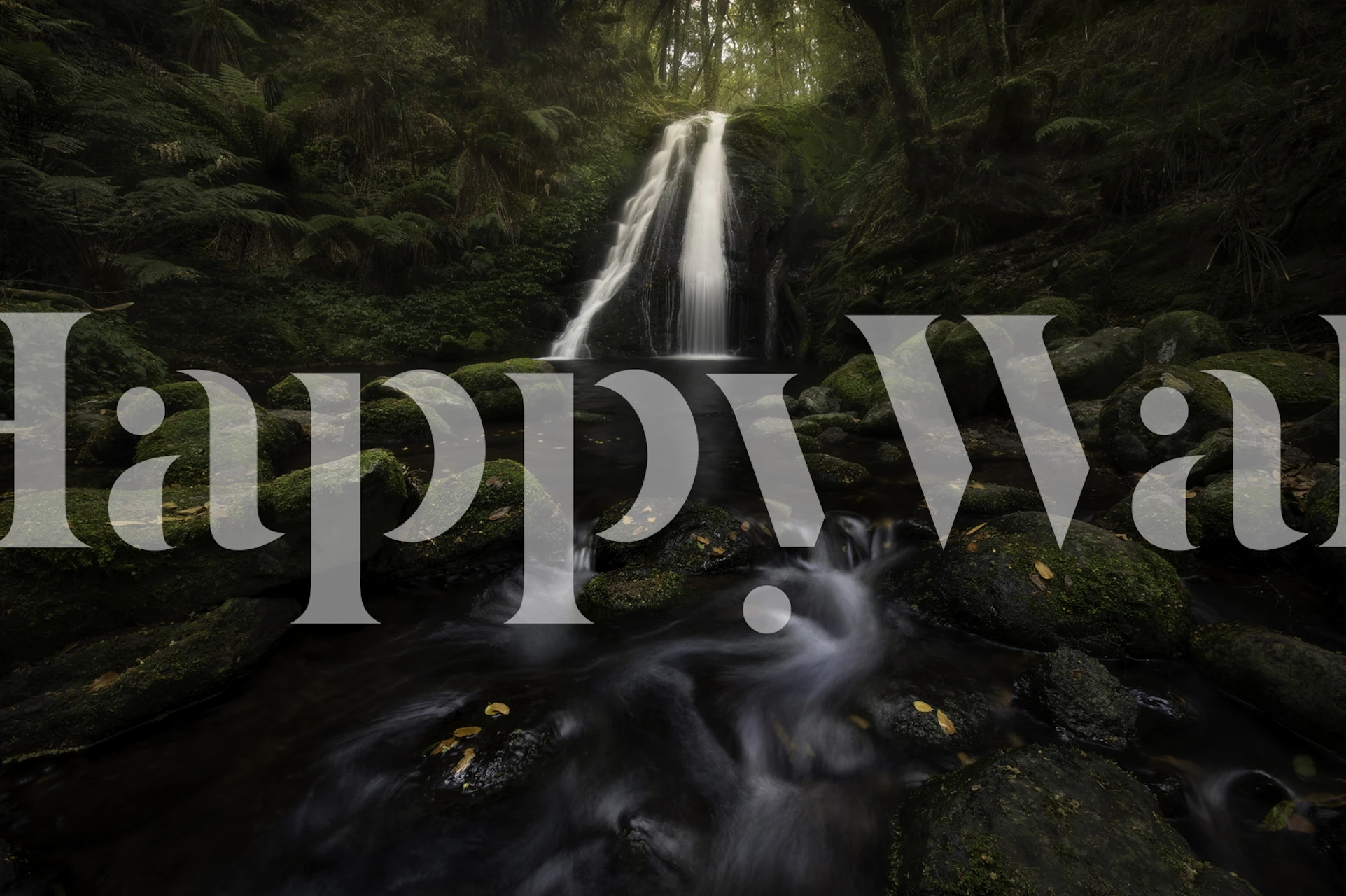 Wallpaper design featuring a graceful waterfall