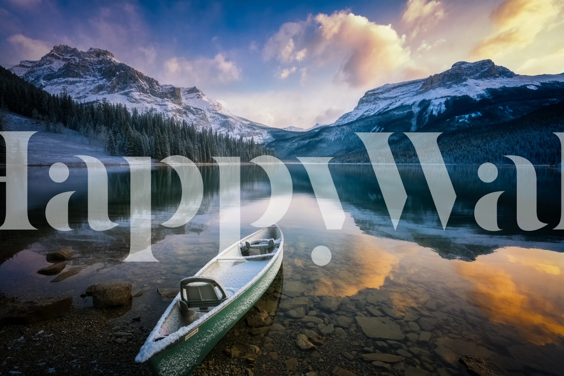 Un mural sereno junto al lago con majestuosas montañas y una canoa, que captura la belleza de la primera nevada en Emerald Lake.