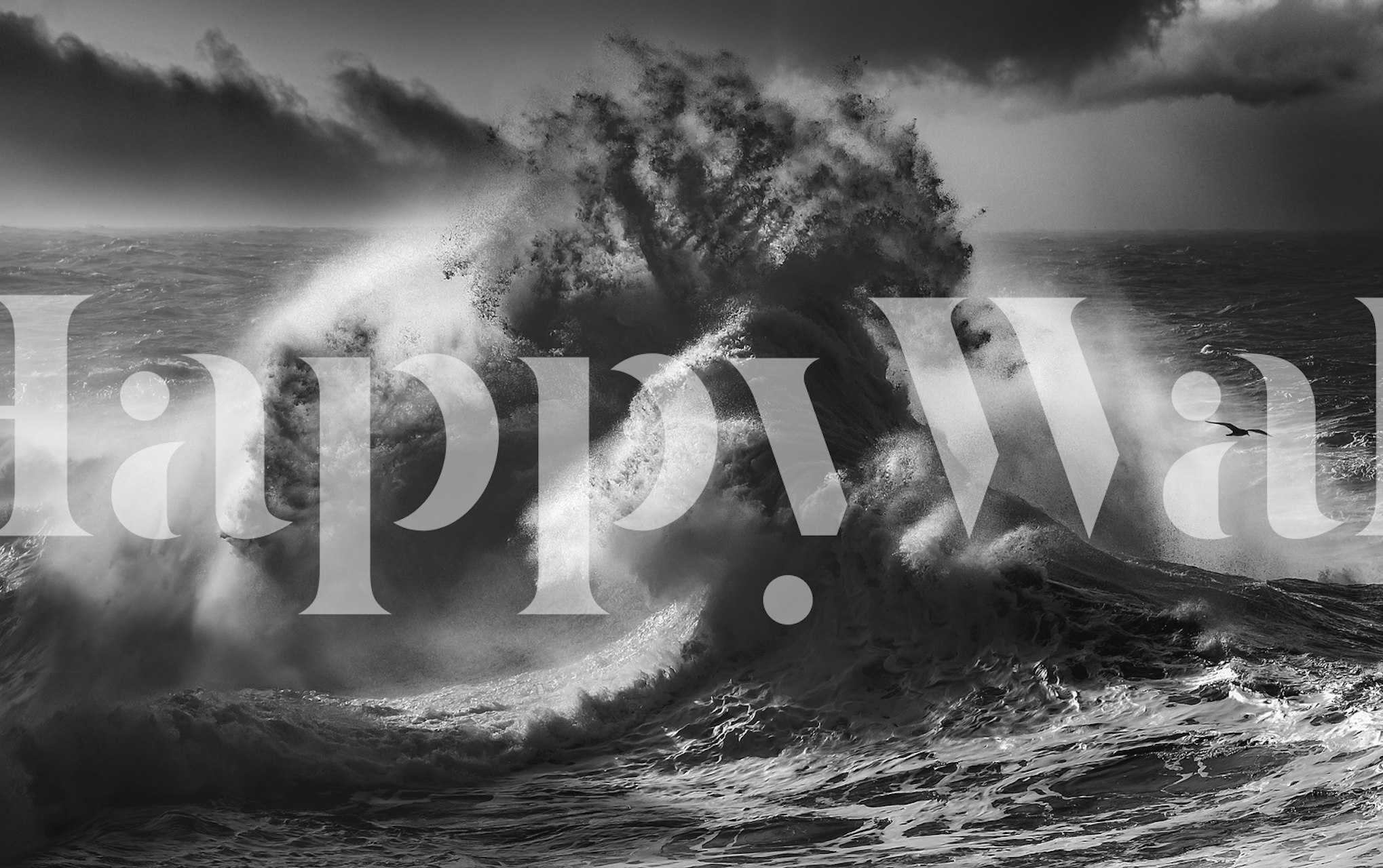 Large crashing ocean wave in shades of black and white wallpaper