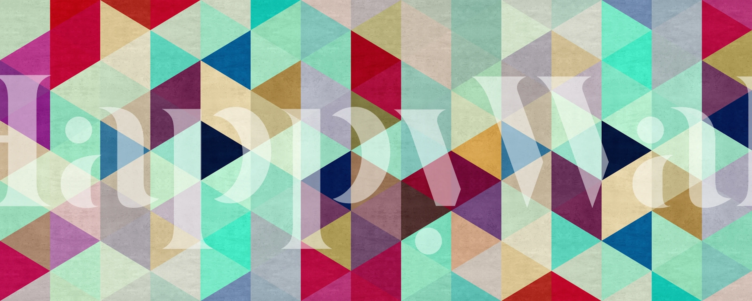 Vibrant wall mural of colored triangles in an interlocking pattern