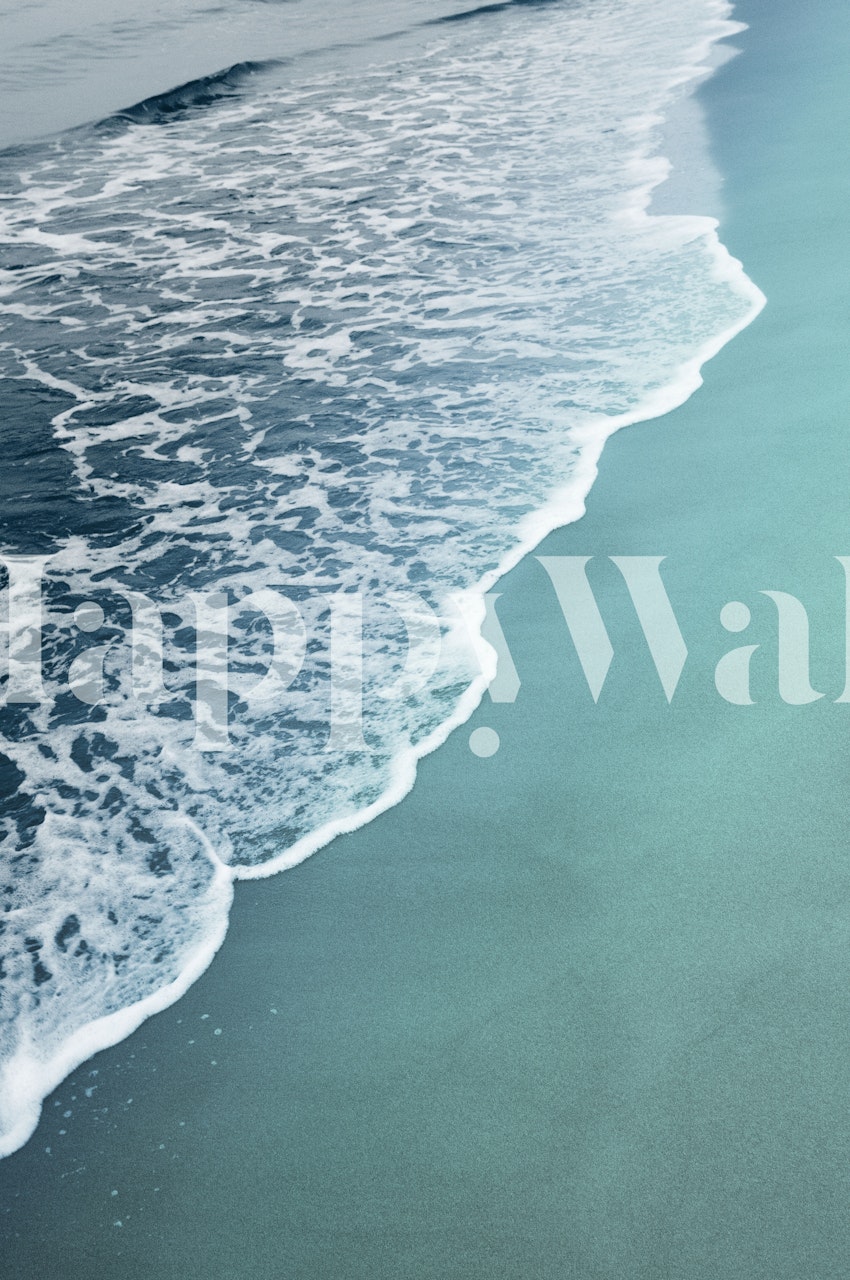 Ocean waves flowing onto a turquoise sandy beach wallpaper