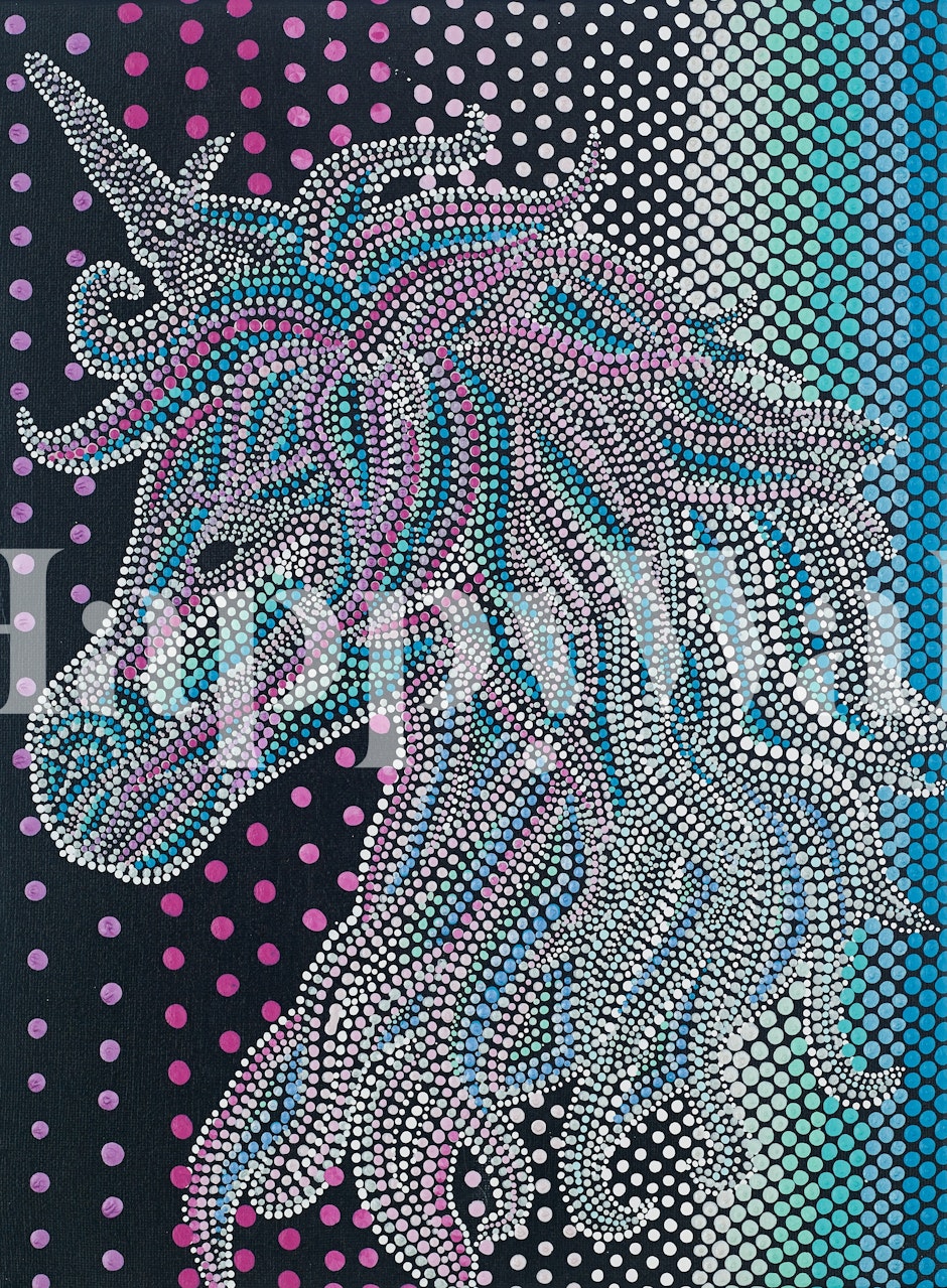 Colorful unicorn design with dots in blue, pink, and purple wallpaper