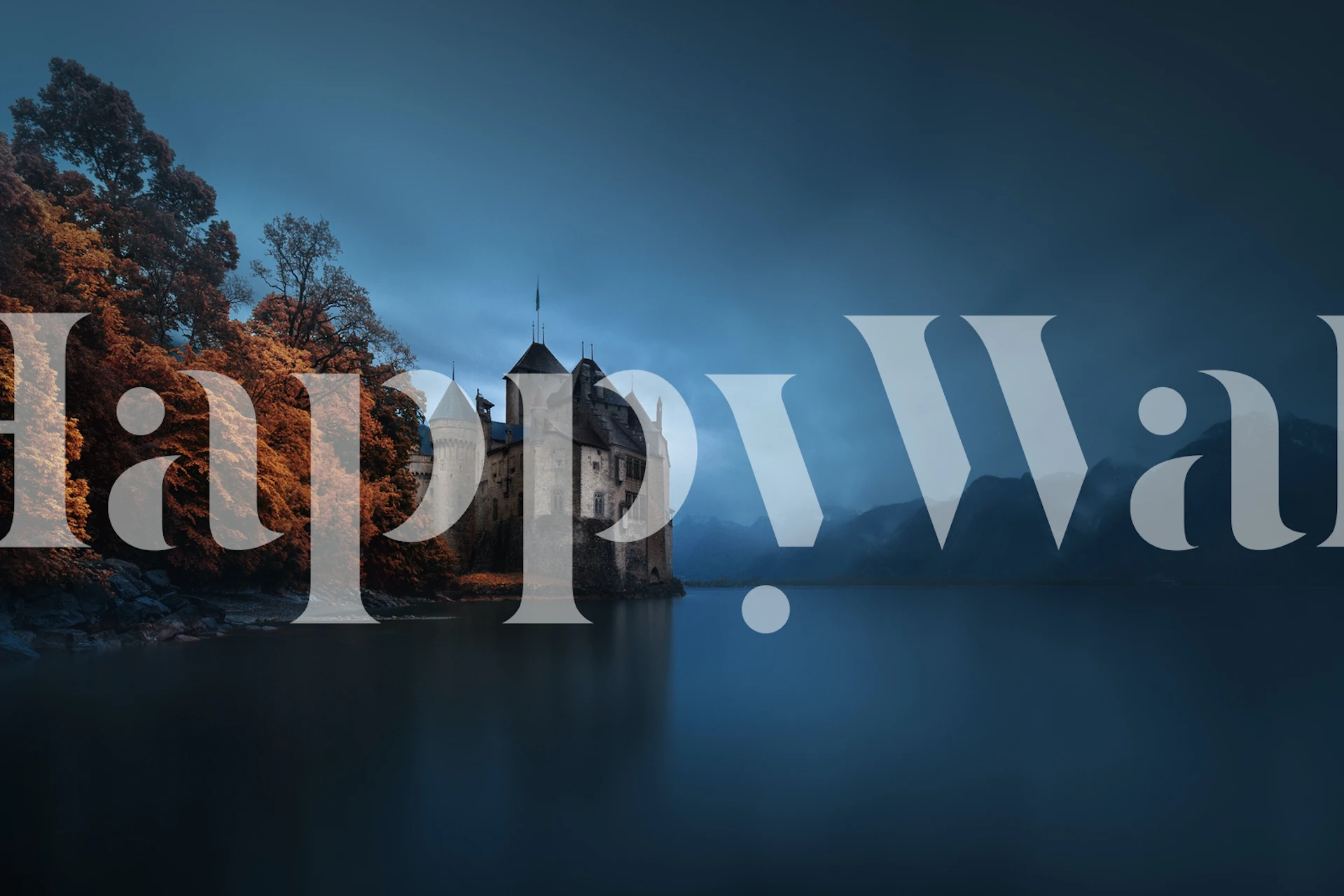 Dark castle on the edge of a serene lake surrounded by autumn foliage and mountains wallpaper