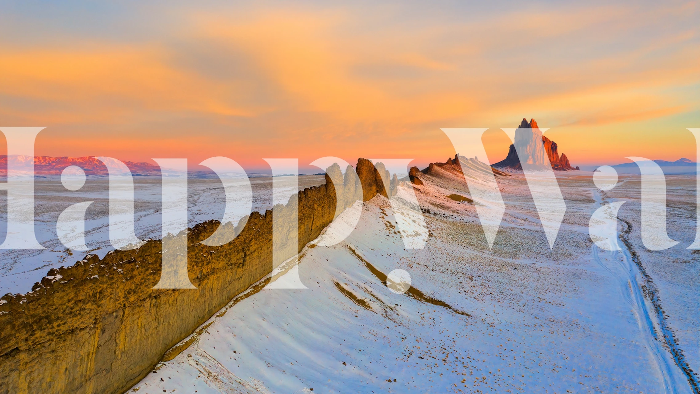 Mountain landscape at sunset with warm colors wallpaper