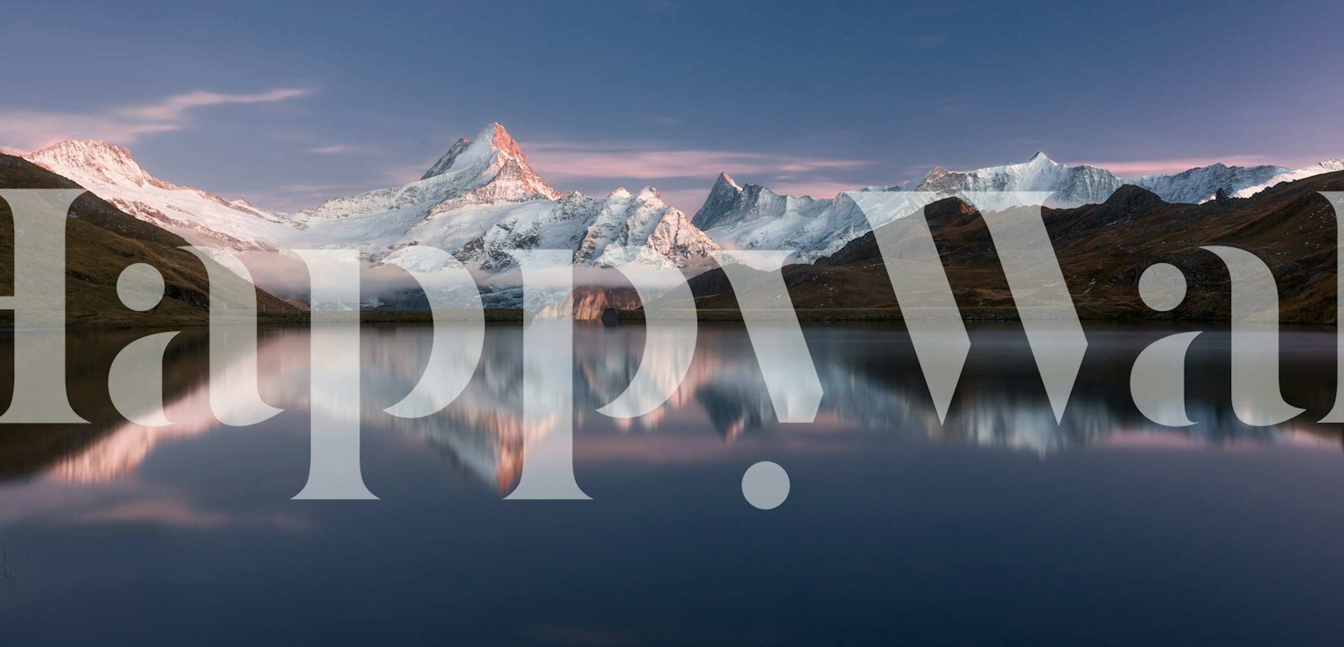 Mountain lake with snow-capped mountains and soft pastel sky wallpaper