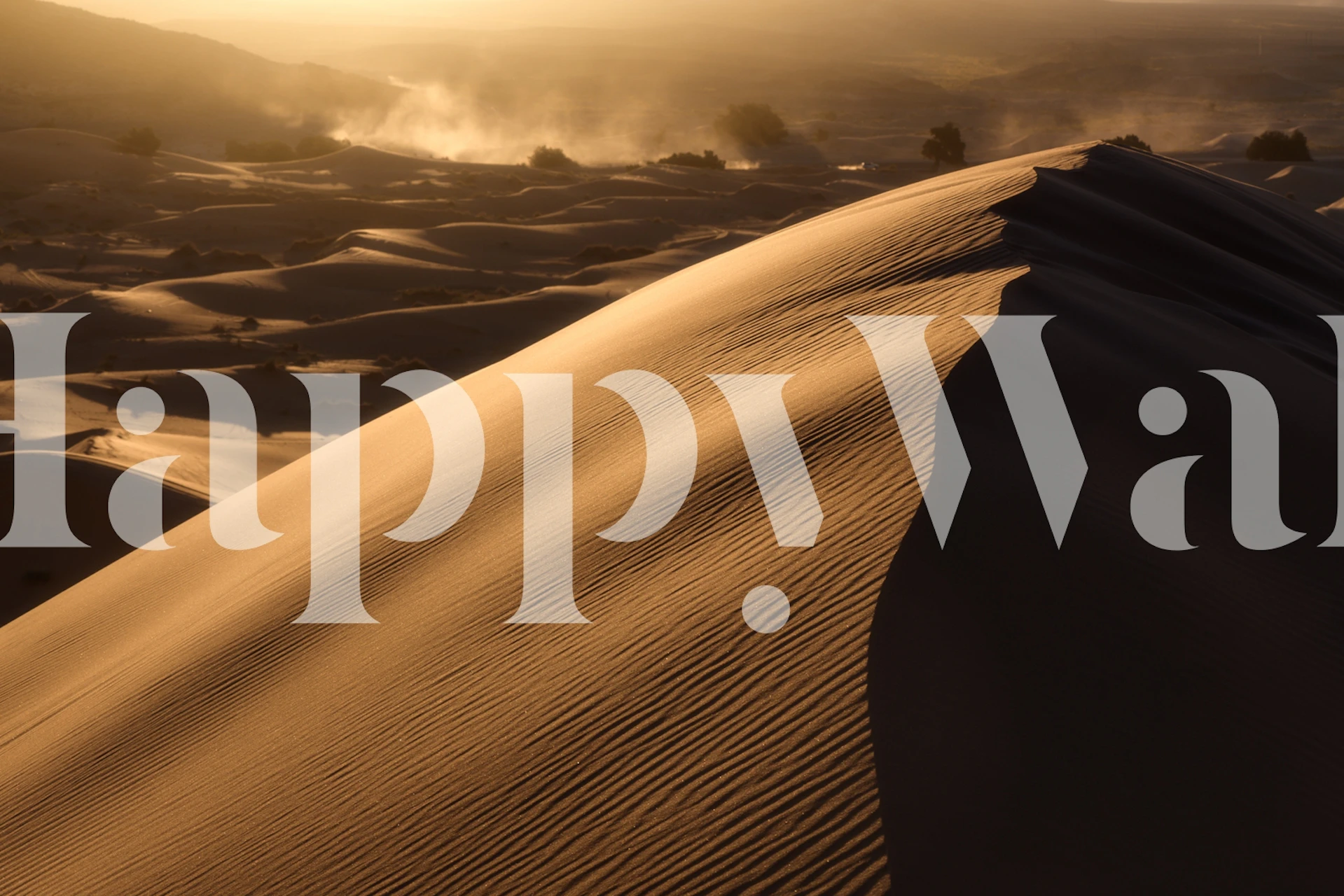 Sandy dunes with soft curves and warm tones wallpaper