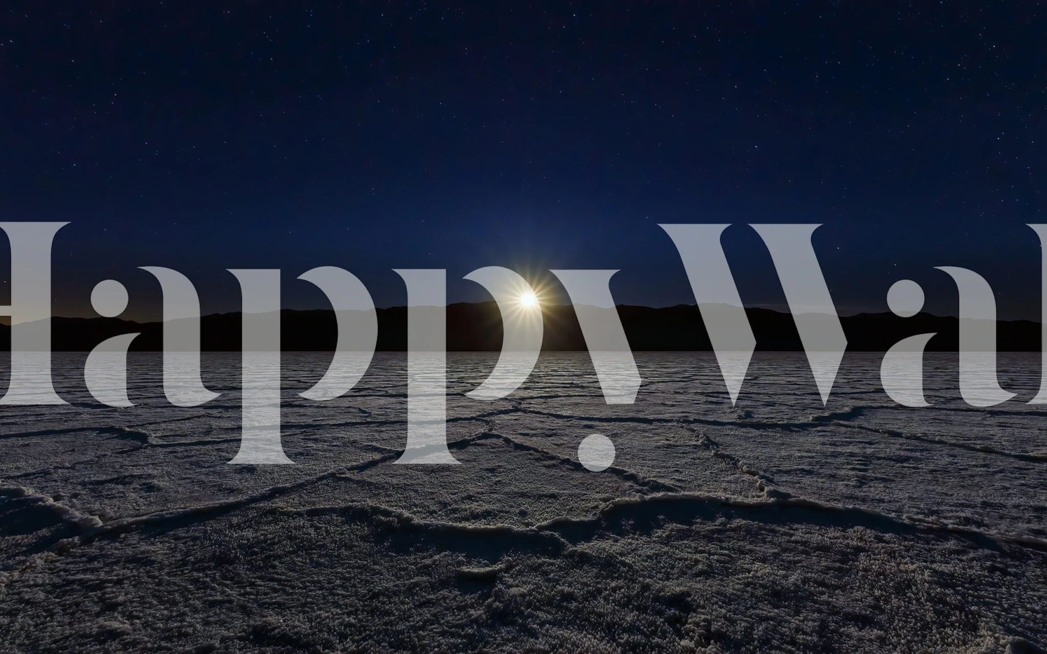 Moonset over a desert landscape wallpaper