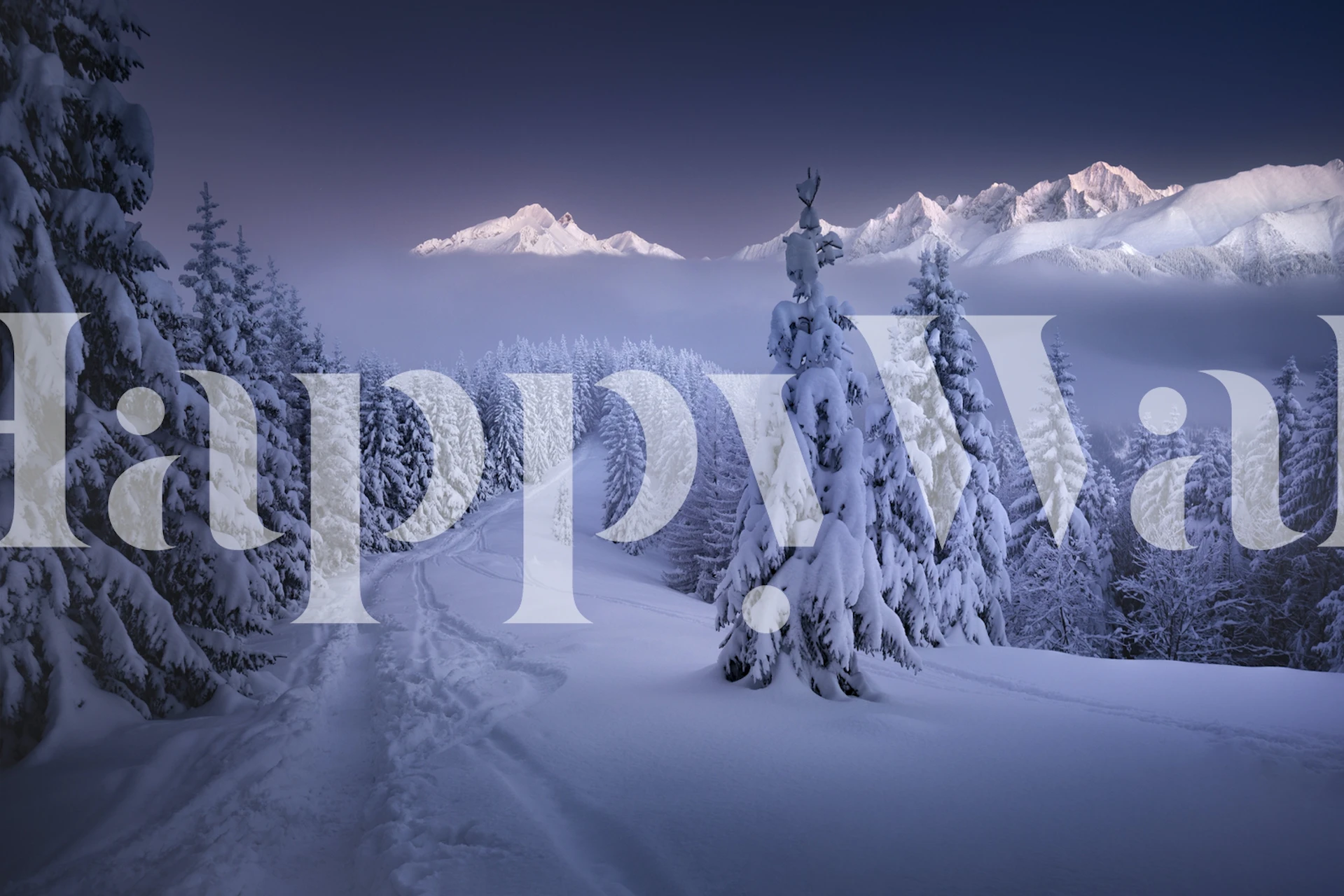 Snowy trees and mountains under soft blue and white tones wallpaper