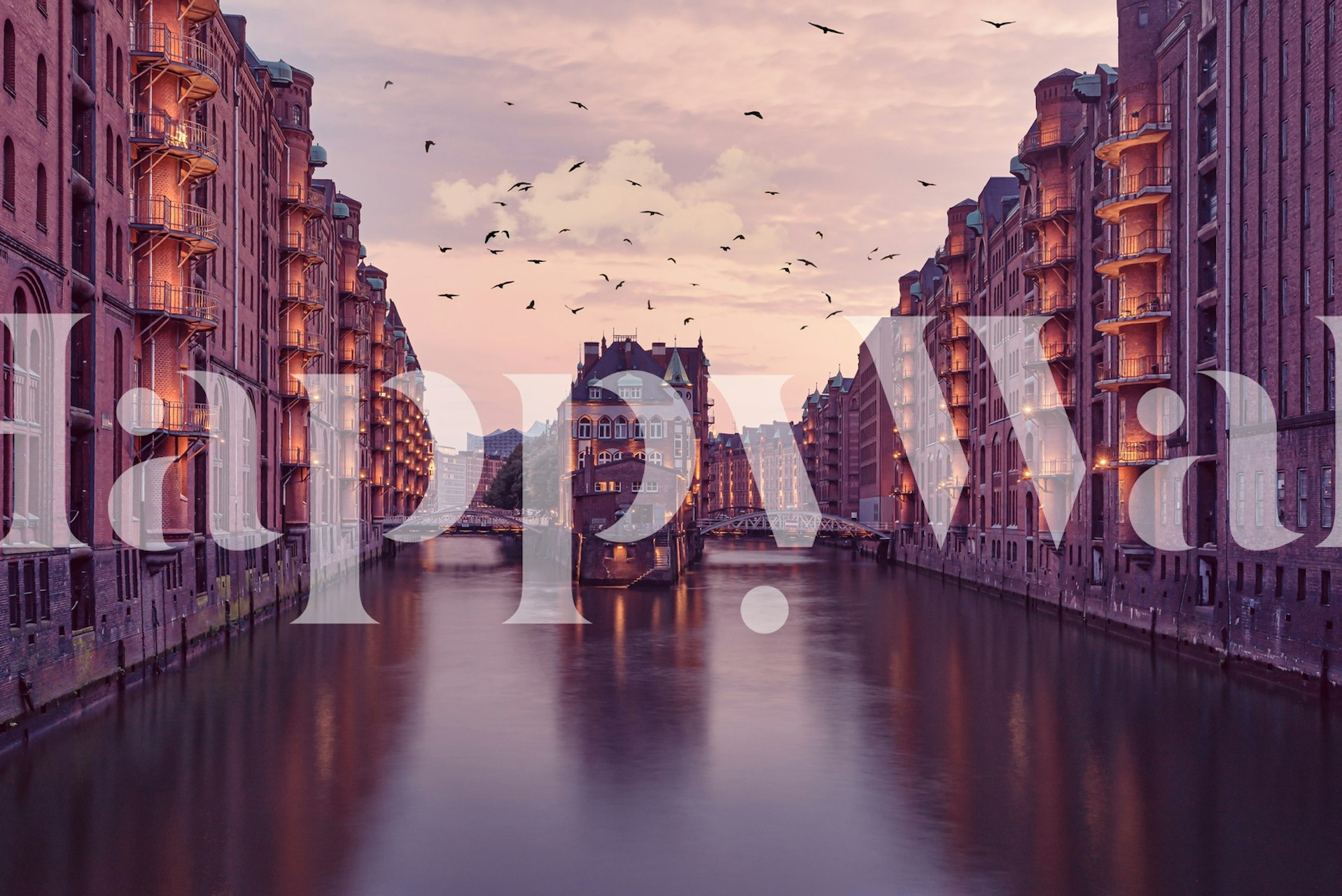 Tranquil waterside warehouses at dusk wall mural