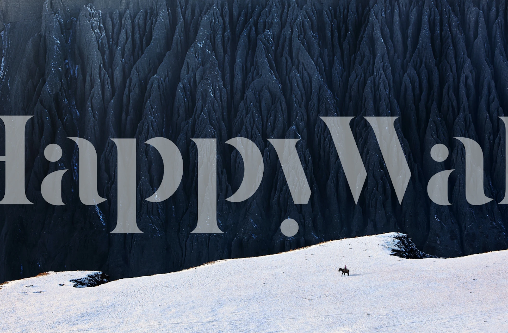 Dramatic black mountain landscape wallpaper with a snowy foreground