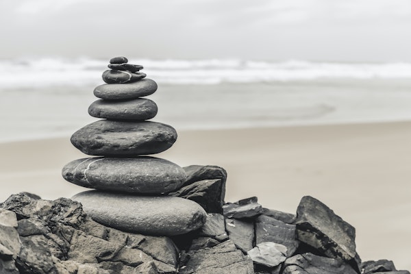 Stone Cairn At Algarve Beach