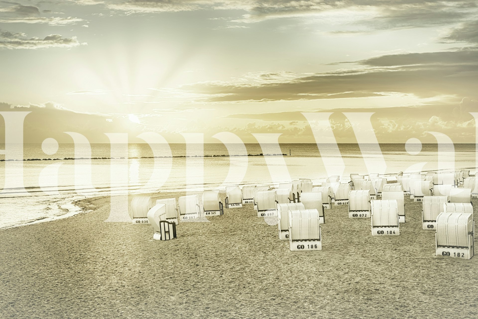 Beach deck chairs at sunrise with golden rays wallpaper