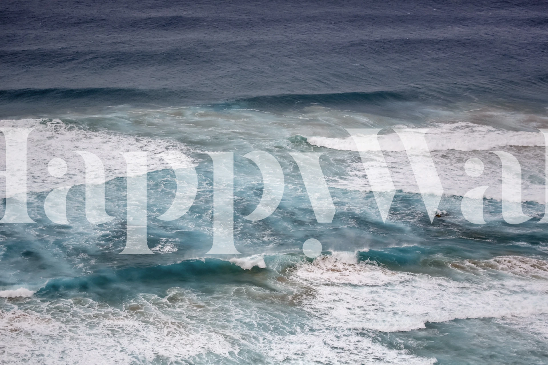Rough surf wallpaper in a coastal setting