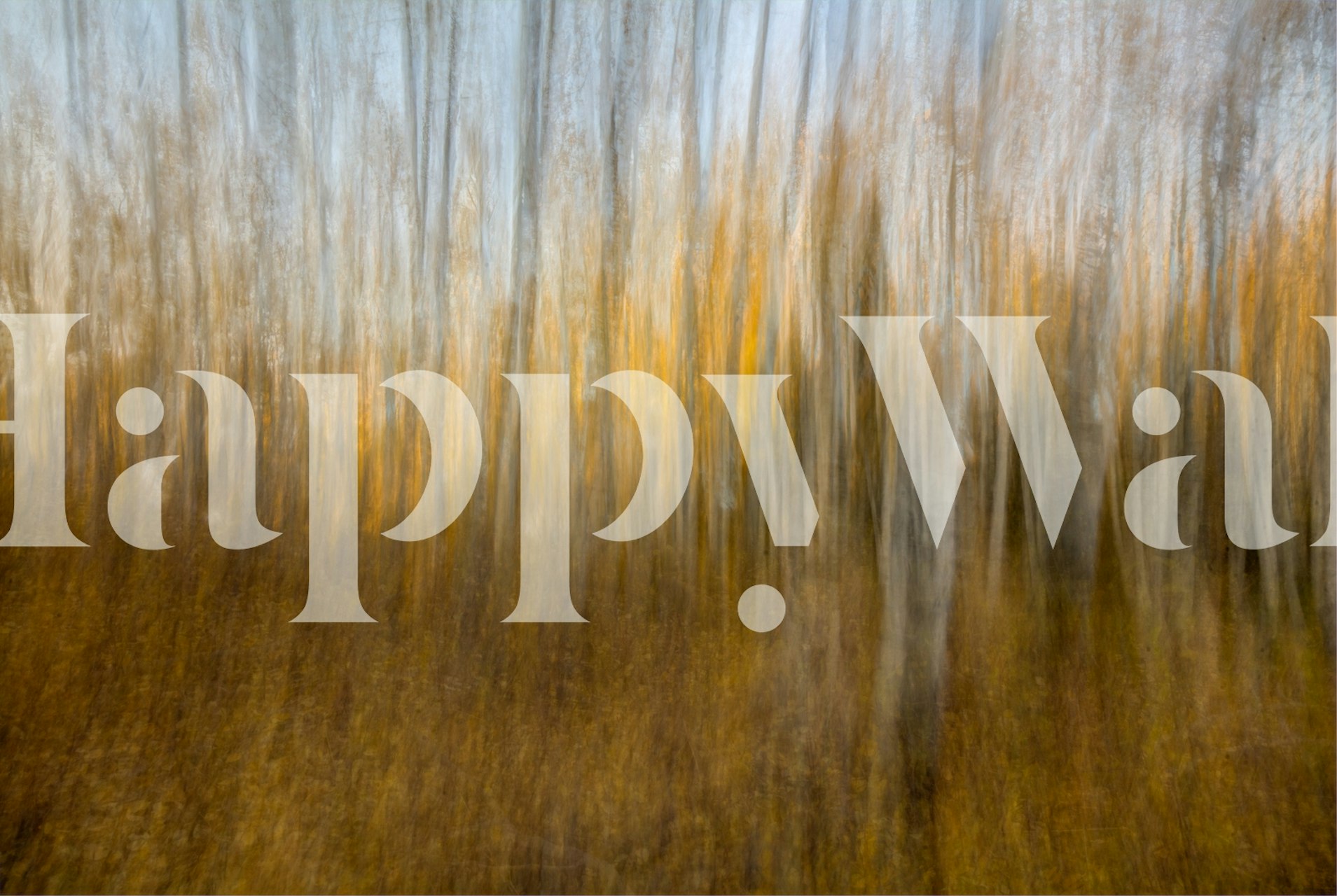 Abstract autumn forest wall mural with warm hues and artistic blur effect