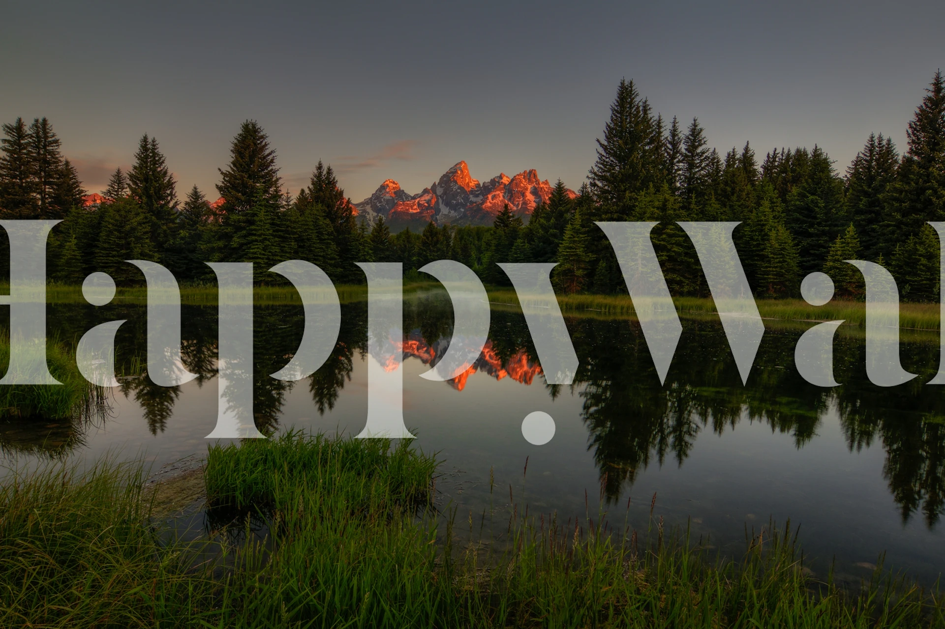 Muurschildering bij zonsopgang in het Grand Teton-gebergte met reflecterend water