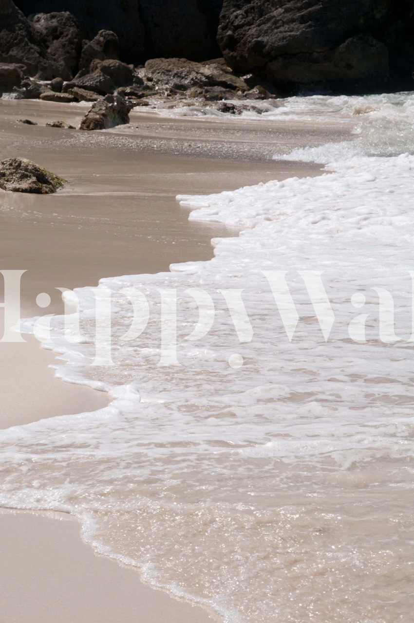 Tropical beach scene with soft white waves and sandy colors wallpaper