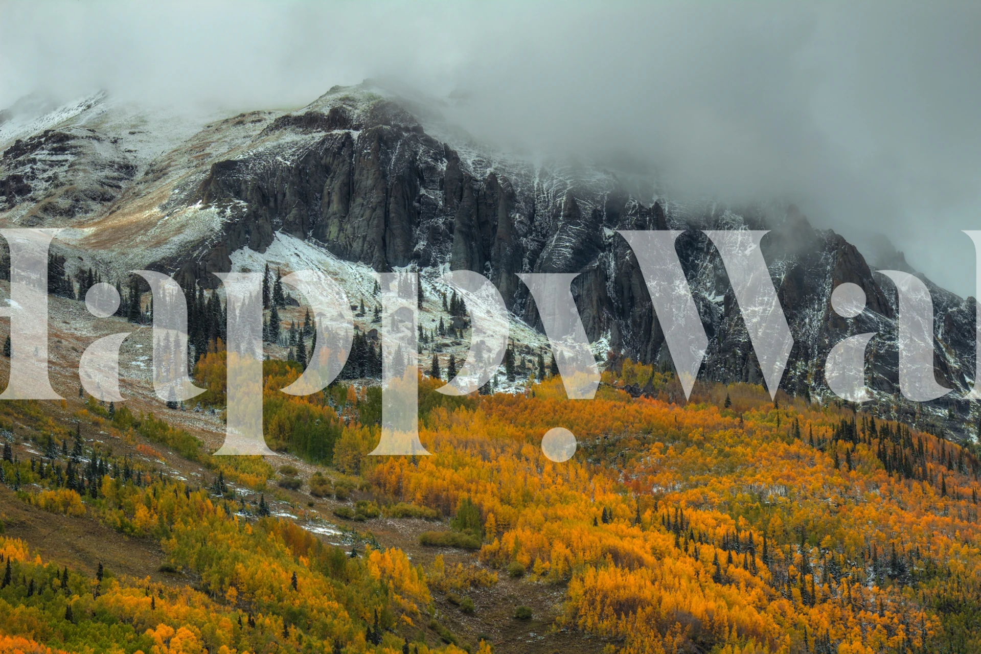 Mountain landscape with autumn trees and snowy peaks wallpaper