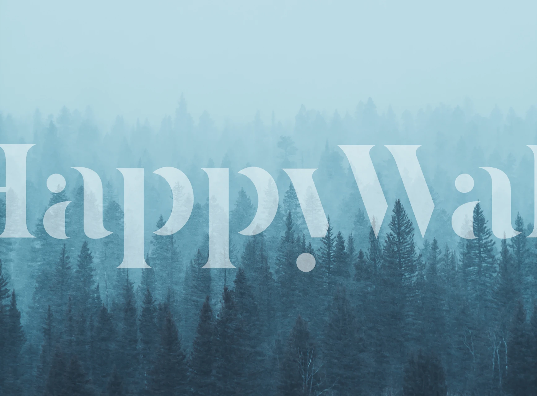 Blue misty forest wall mural with silhouette trees