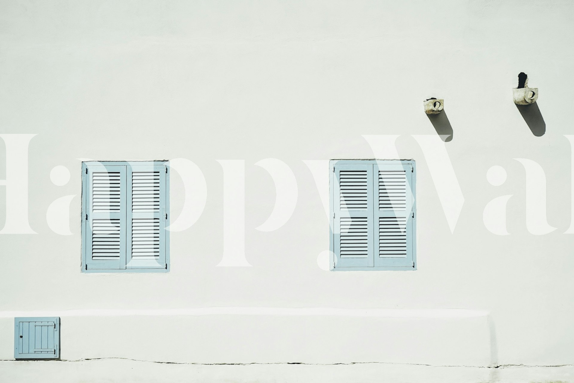 White wall with blue shutters and ventilation in a clean Mediterranean style wallpaper