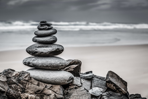 Rock Balancing At The Sea