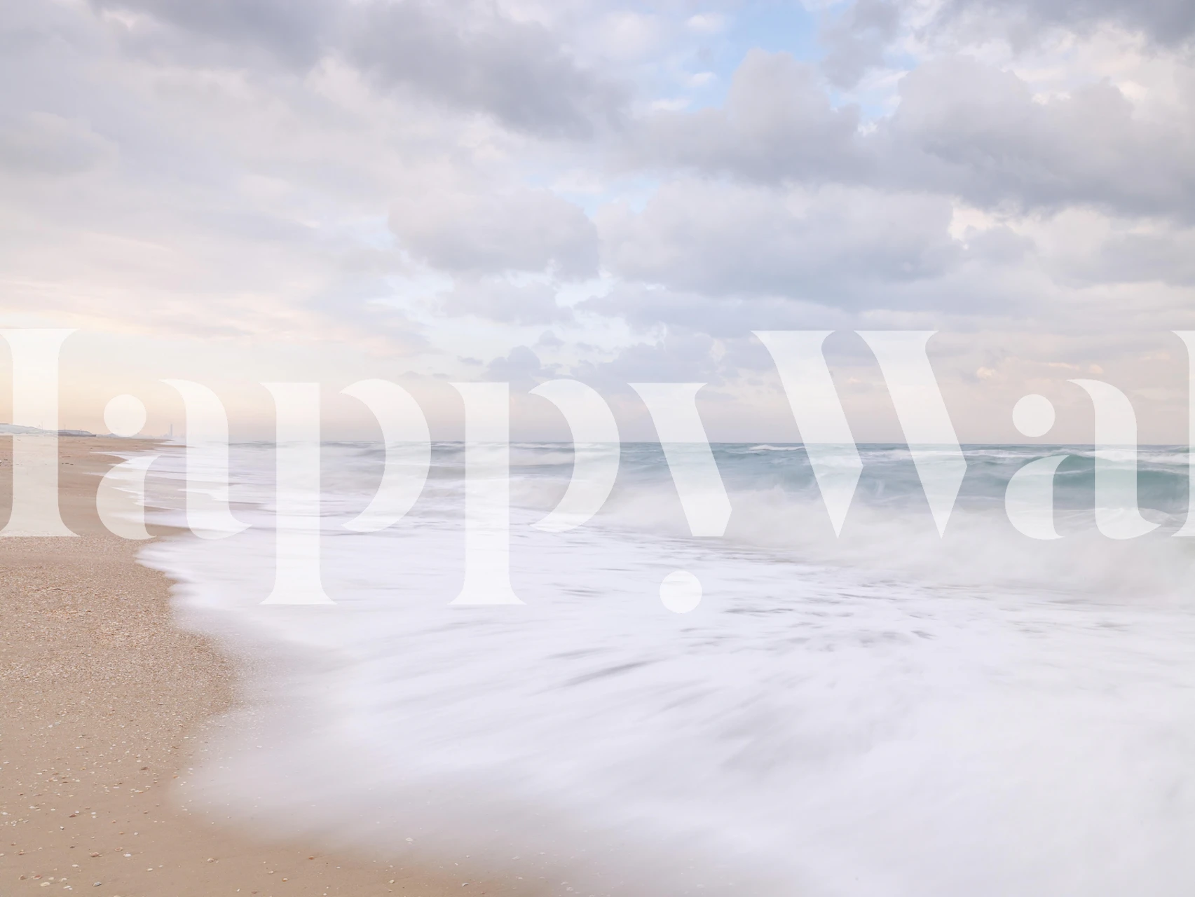 Uklidňující plážová fototapeta s jemnými vlnami a měkkým pískem