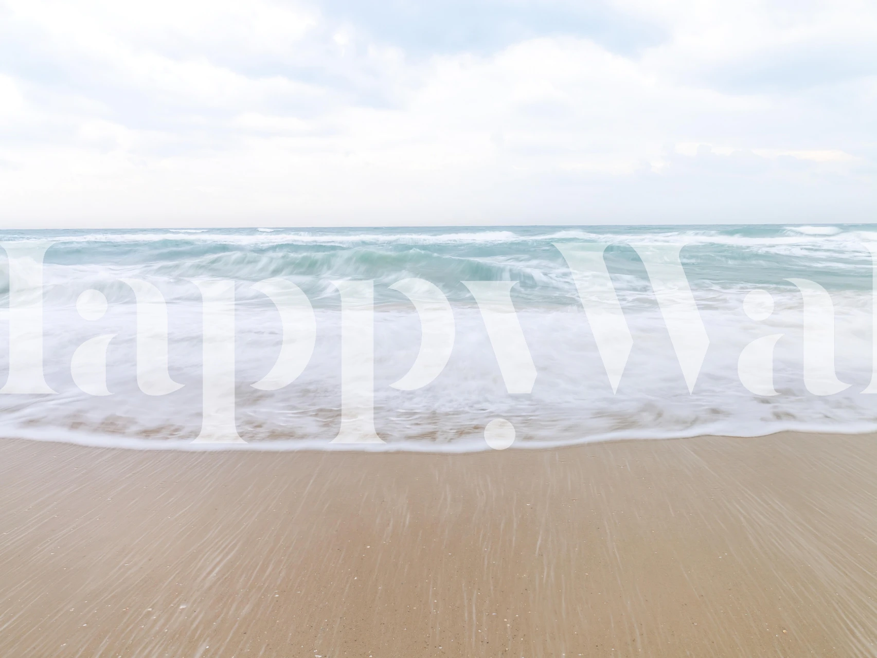 Calm beach waves and sandy shore wallpaper