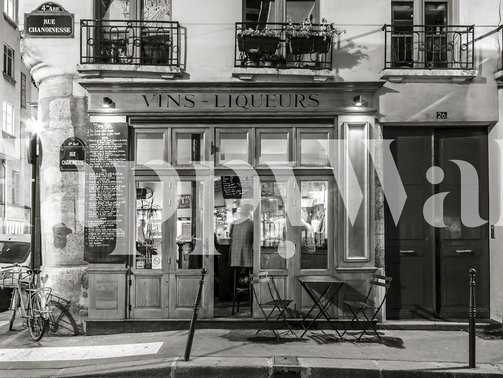 Parisian cafe exterior in black and white wallpaper