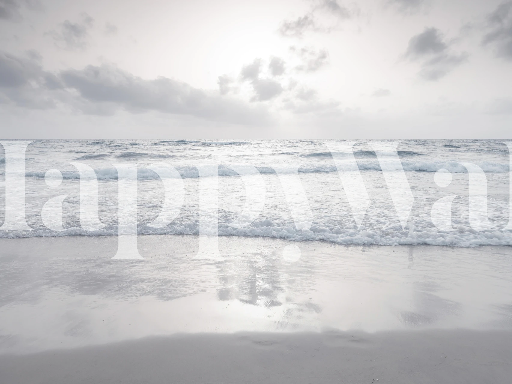 Tranquil beach scene with ocean waves and clouds wallpaper