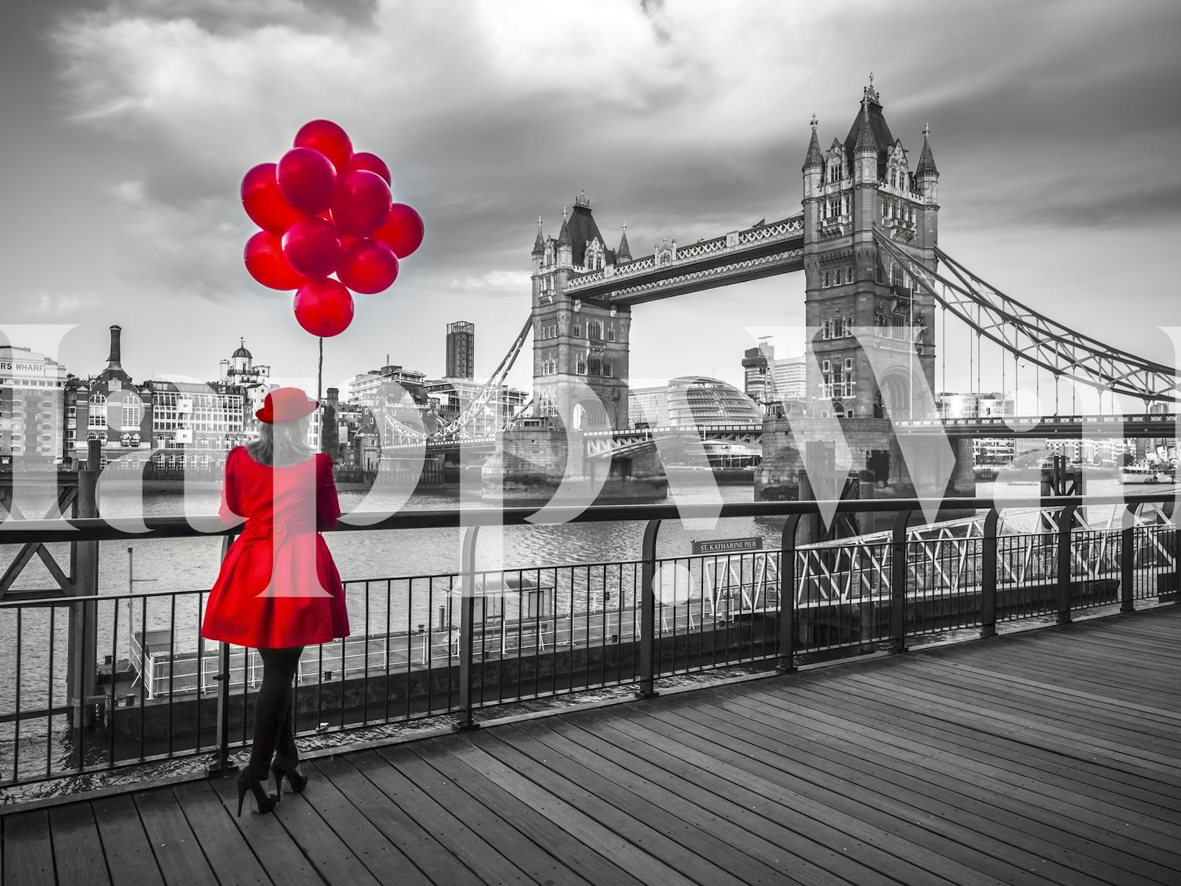 Woman in red dress with balloons near London Bridge, black and white background wallpaper
