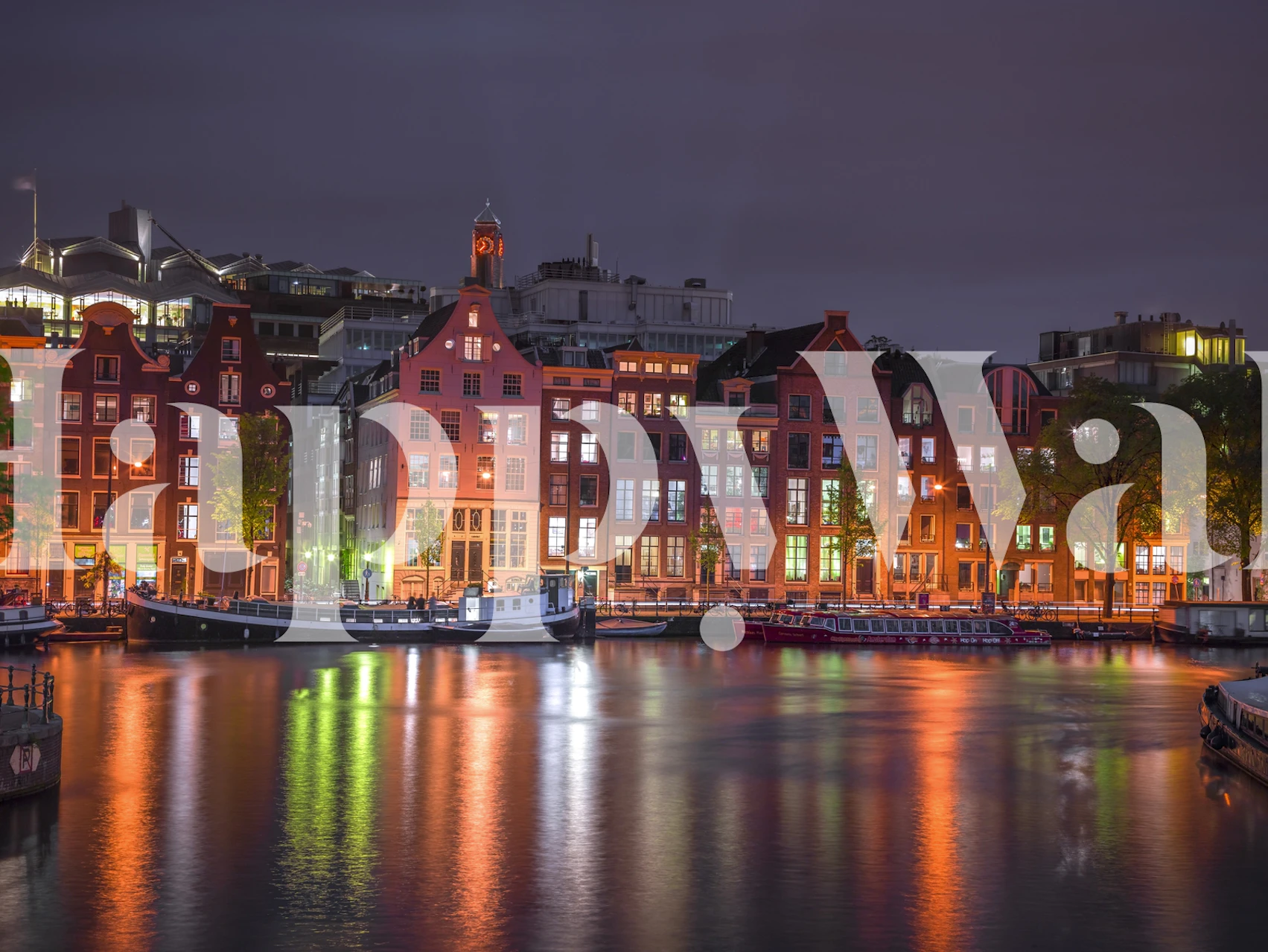 Amsterdam canal night wallpaper with colorful buildings and reflections