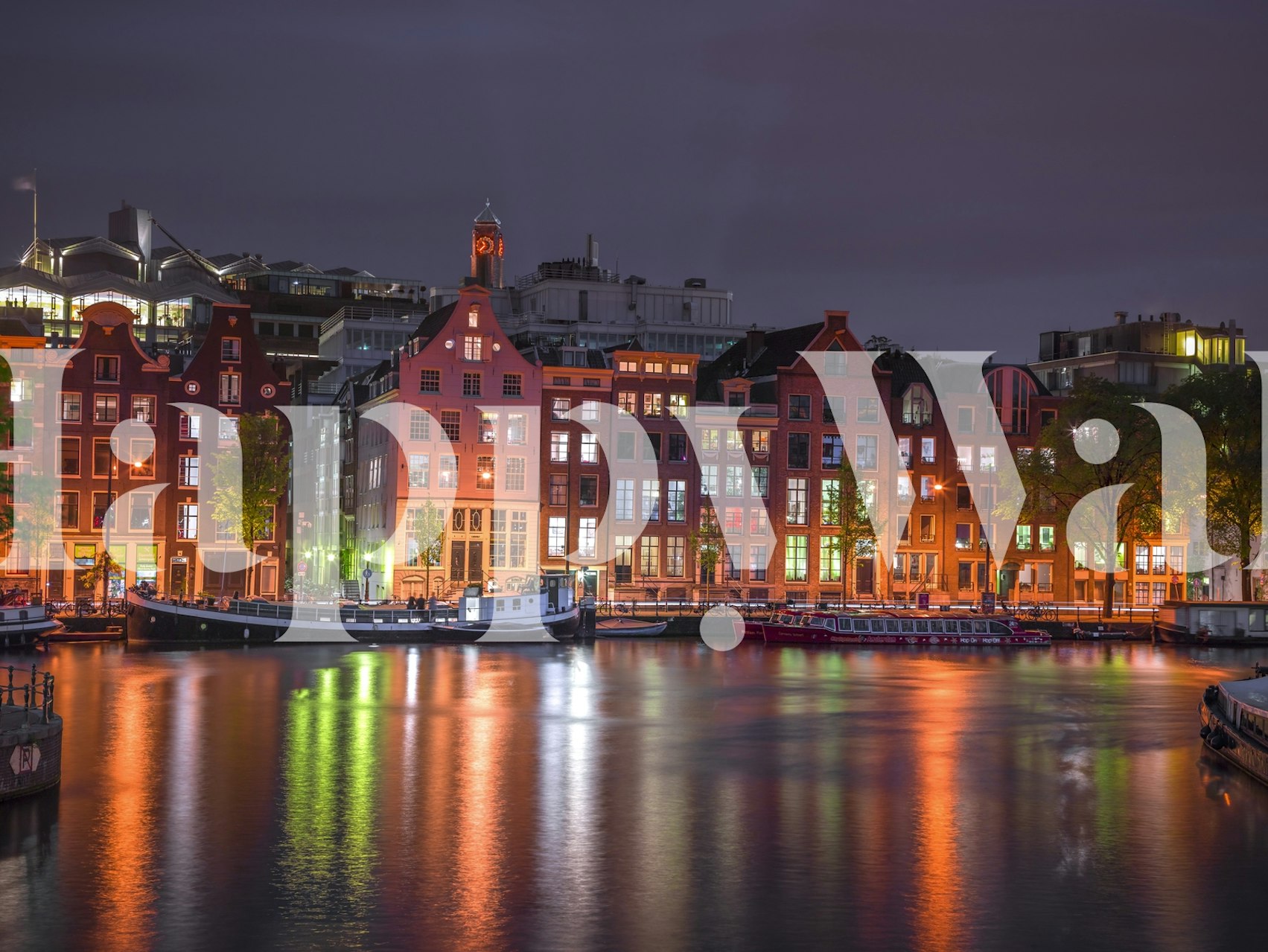 Amsterdam canal night wallpaper with colorful buildings and reflections