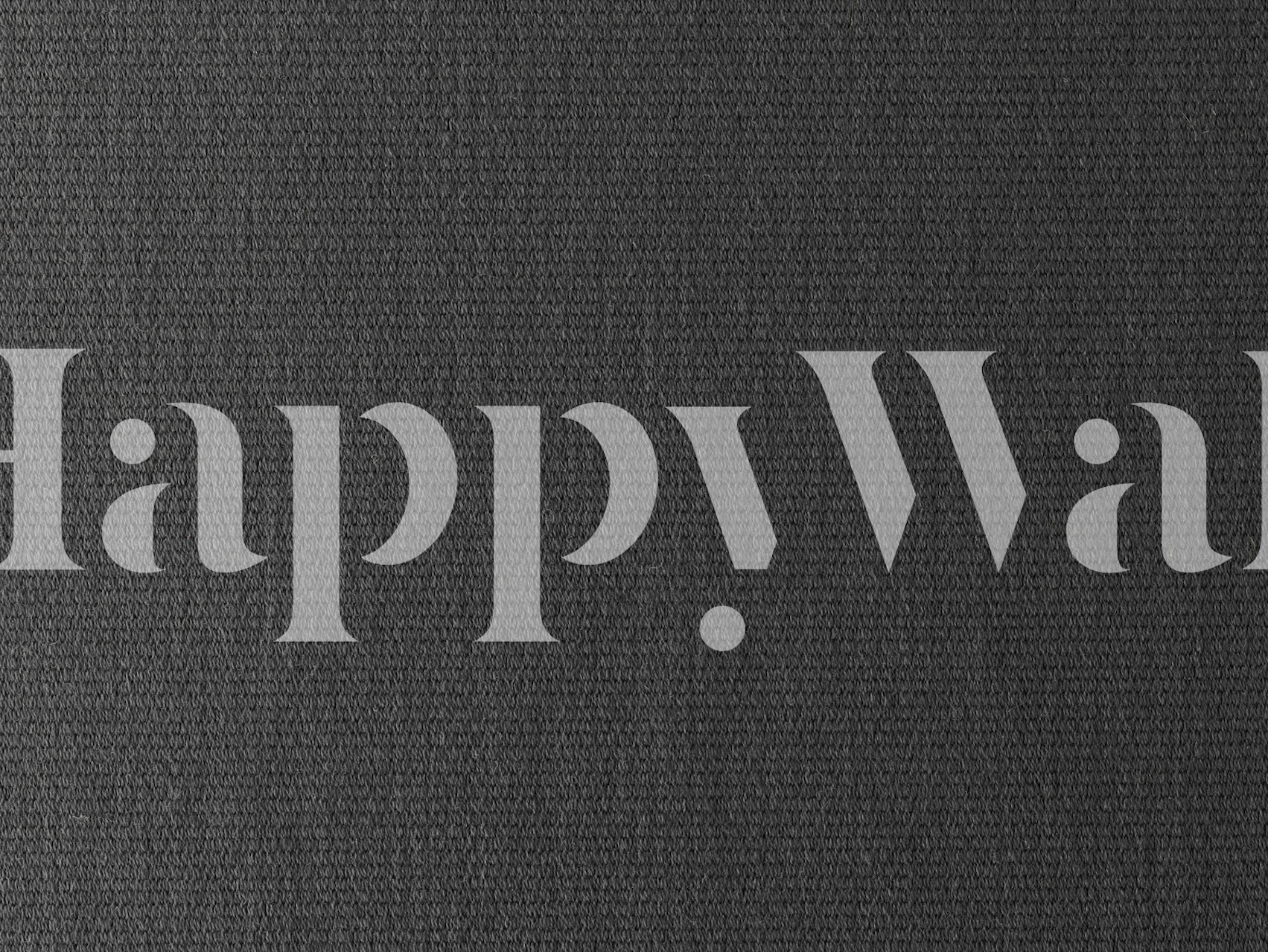 Black textured fabric wall mural with a woven pattern