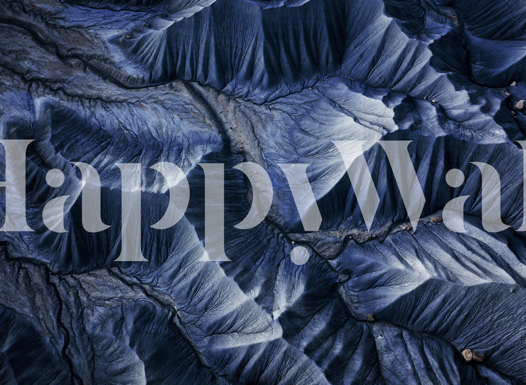 Textured blue wallpaper with layered patterns and deep shades