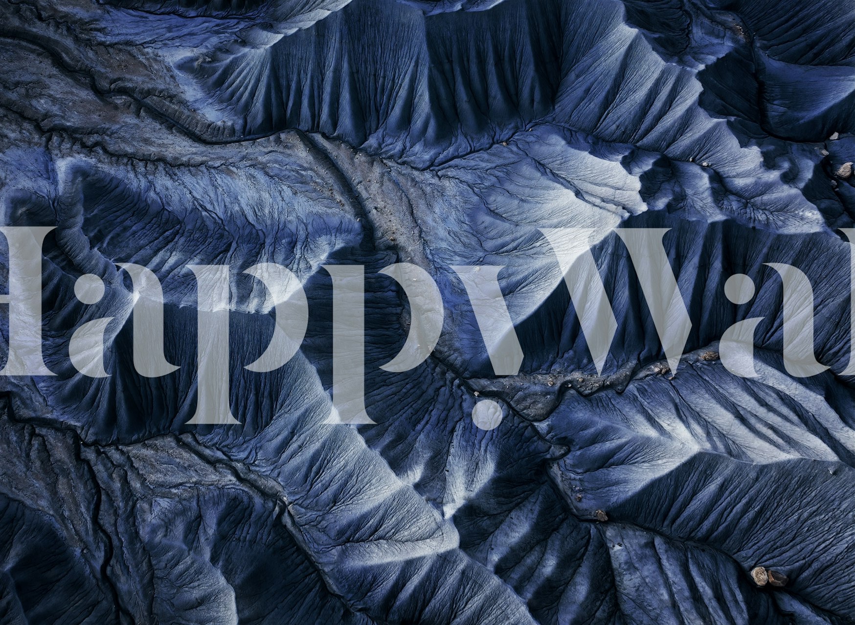 Textured blue wallpaper with layered patterns and deep shades