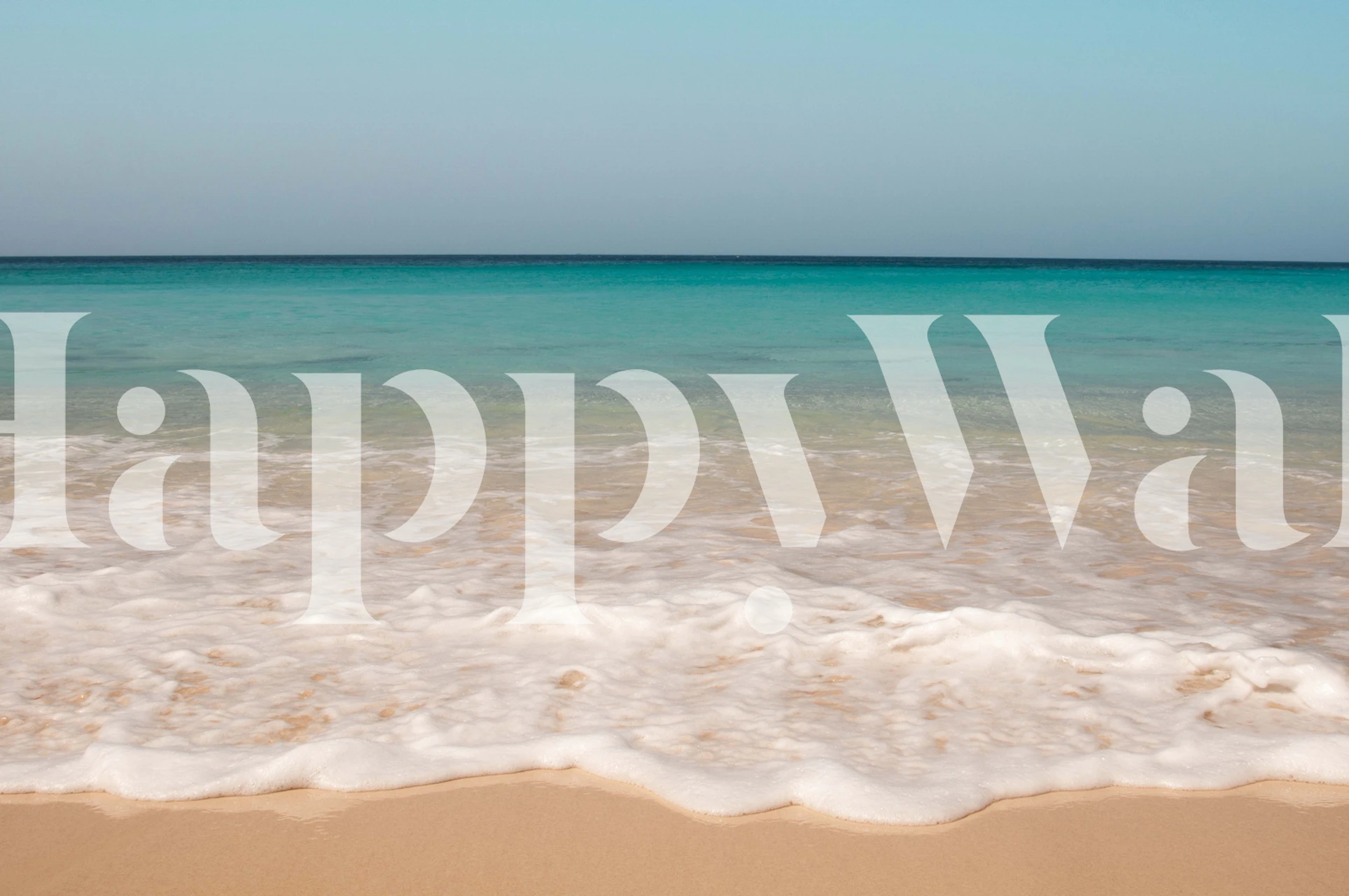 Caribbean ocean beach scene with gentle waves and sandy shore wallpaper