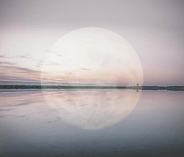 Surreal Moon Over Calm Water