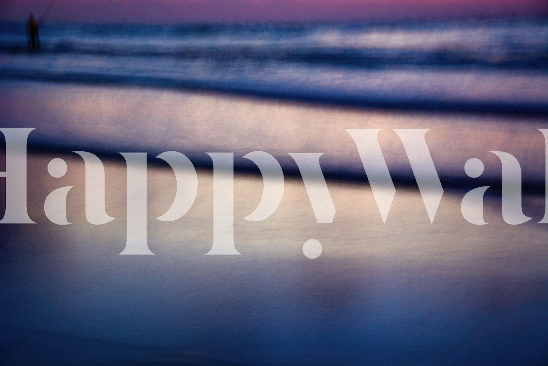 Blurry ocean waves at sunset with soft blue and pink tones wallpaper