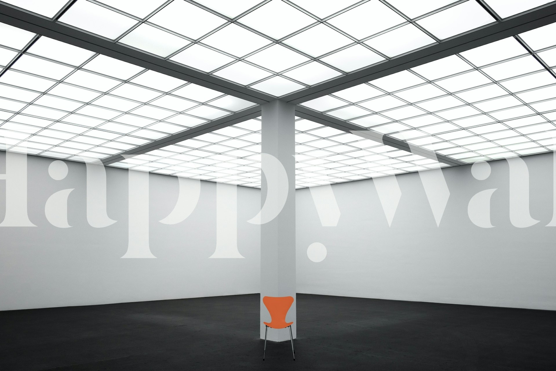 Minimalist wall mural with a single orange chair in a spacious room with a glass ceiling